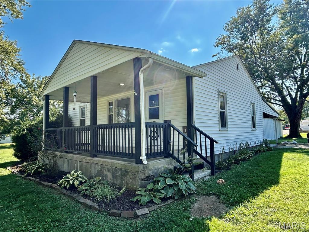 Charming Corner-Lot Home with Extra Lot! Welcome home to this cozy 3-bedroom, 1-bathroom property nestled on a corner lot with an additional lot included! Remodeled in 2022 and featuring a brand-new roof installed in 2026, this home offers a great combination of comfort, updates, and extra space.  Enjoy relaxing on the cozy front porch, or spend those beautiful summer and fall evenings in the carport, perfect for entertaining, relaxing, or enjoying the outdoors.  The home also features an exterior entrance to the basement, providing convenient access to even more storage space. Need additional room for tools, lawn equipment, hobbies, or outdoor belongings? There’s also a storage building on the property.  With the added bonus of the extra lot, this property offers plenty of outdoor space and possibilities. Whether you're a first-time buyer, looking for a comfortable home, or wanting additional land and storage, this one is worth a look!