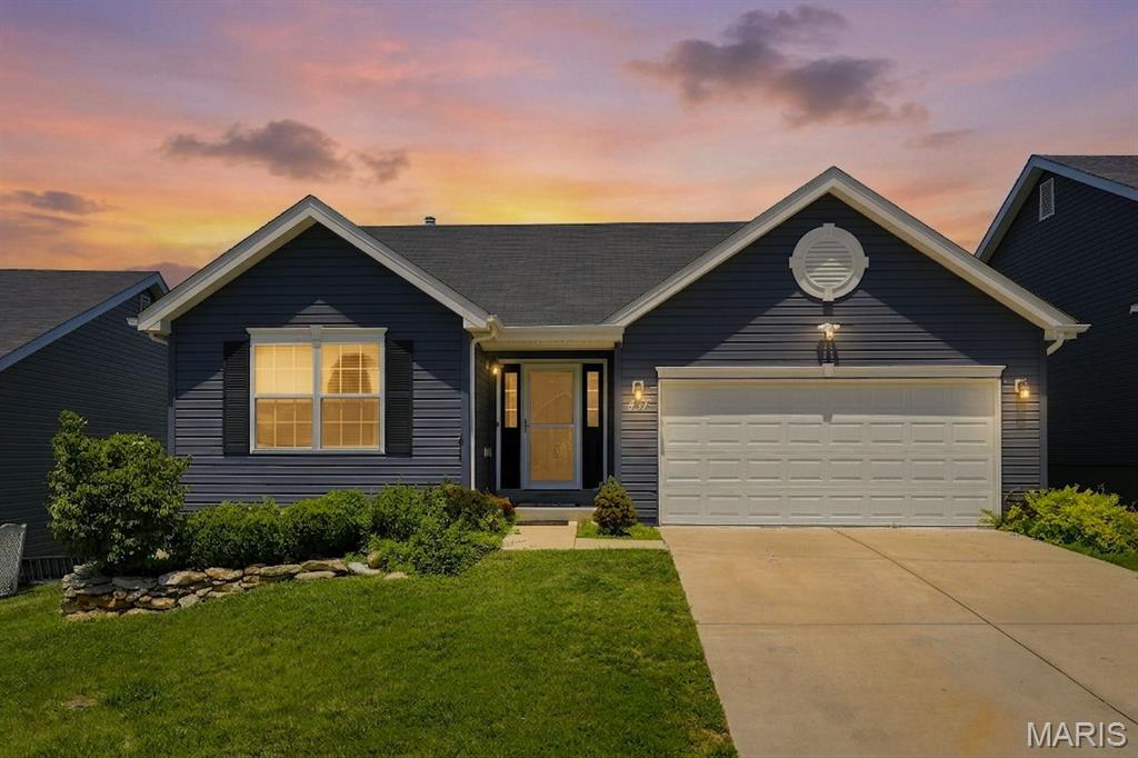 Welcome to 457 Timber Valley Trail in Fenton—located in the highly sought after Winding Bluffs subdivision within the Fox School District.
This beautiful 3 bedroom, 2 bath home backs to scenic common ground with a walking trail directly behind the property that leads to the neighborhood dog park. You’ll also enjoy access to a community fishing pond, perfect for relaxing weekends outdoors.
Inside, the home features a walk out basement, upstairs laundry, and an open concept kitchen that flows seamlessly into the living room, creating an ideal space for everyday living and entertaining. The eat in kitchen offers a walk out to the maintenance free deck, where you can take in peaceful views of the green space behind the home.
Conveniently located near Gravois Bluffs shopping, dining, and amenities, this property combines comfort, convenience, and community living.