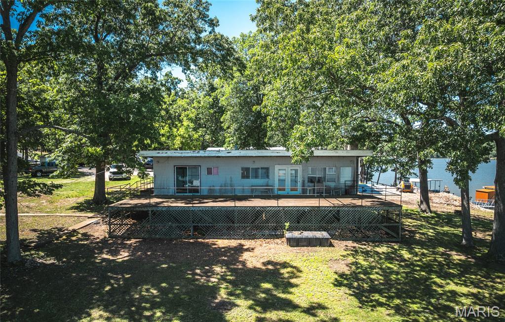 Online-Only Auction – Premier Point Property on Lake of the Ozarks
Outstanding opportunity on the iconic Lake of the Ozarks! This online-only auction features a rare .97± acre first-tier point lot offering approximately 465± feet of shoreline on the main channel.

Positioned on a beautiful point with water on two sides, this property delivers breathtaking year-round views and incredible lake presence. The gently sloping yard provides excellent access to the water, and a permitted 2-slip dock is already in place — ready for immediate enjoyment.

An older home currently sits on the property, and utilities are already in place for your future dream home build. The true value is in the land, location, and extensive shoreline — opportunities like this are becoming increasingly rare.

Conveniently located close to dining, shopping, and lake amenities, this property combines privacy, views, and accessibility.

Online-only bidding. Property sells subject to auction terms and conditions.

Rare main channel frontage. Nearly an acre. Expansive shoreline. Don’t miss this chance to secure a premier Lake of the Ozarks property at auction

There will be an open house on Saturday April 25 from 8:00 AM to 2:00 PM

https://www.ltdauction.com/auctions/detail/bw158087

Auction begins May 18, 2026