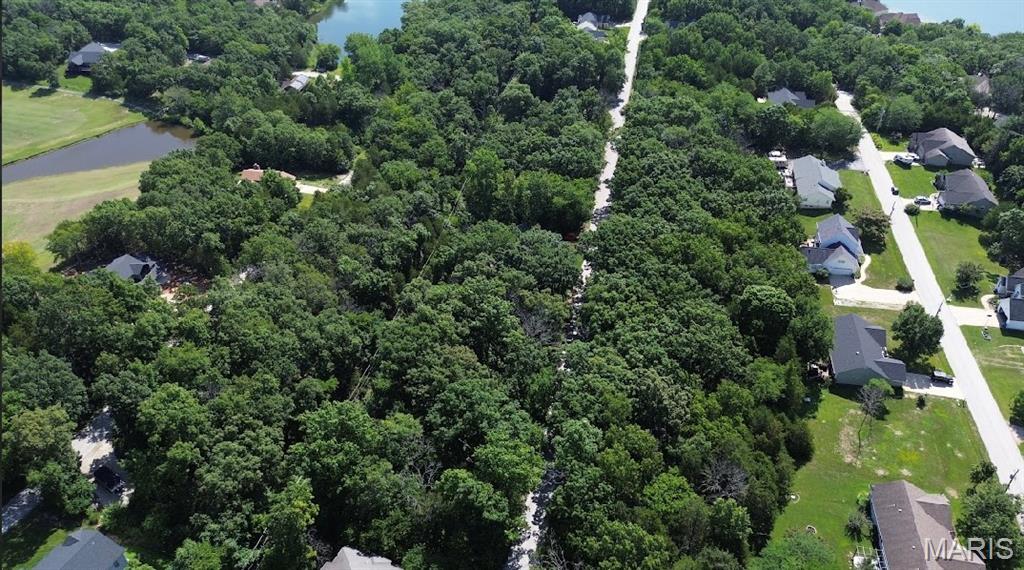 Builders Package: Right down from the BIG LAKE! Buy as an individual lot for lake access or check out the neighboring lots to purchase as a package and save, save, save! These ready-to-build home sites are located in this private, gated, resort-style community with 3 lakes, golf course, campgrounds and more. Perfect for builders to market to anyone seeking a peaceful, recreational lifestyle away from St. Louis, but still very close for easy family visits. Also perfect for get-away lake home. Enjoy the golf course, lake, boating, fishing, clubhouse, pool, etc. ! Just 20 minutes from South County! Builders Package:

Can be combined with:
5615 Katys Way (Cleared Lot) 
5621 Katys Way (Double Lot)
5623 Katys Way (Double Lot)
5629 Katys Way (Double Lot)
5631 Katys Way (Double Lot)

& More!