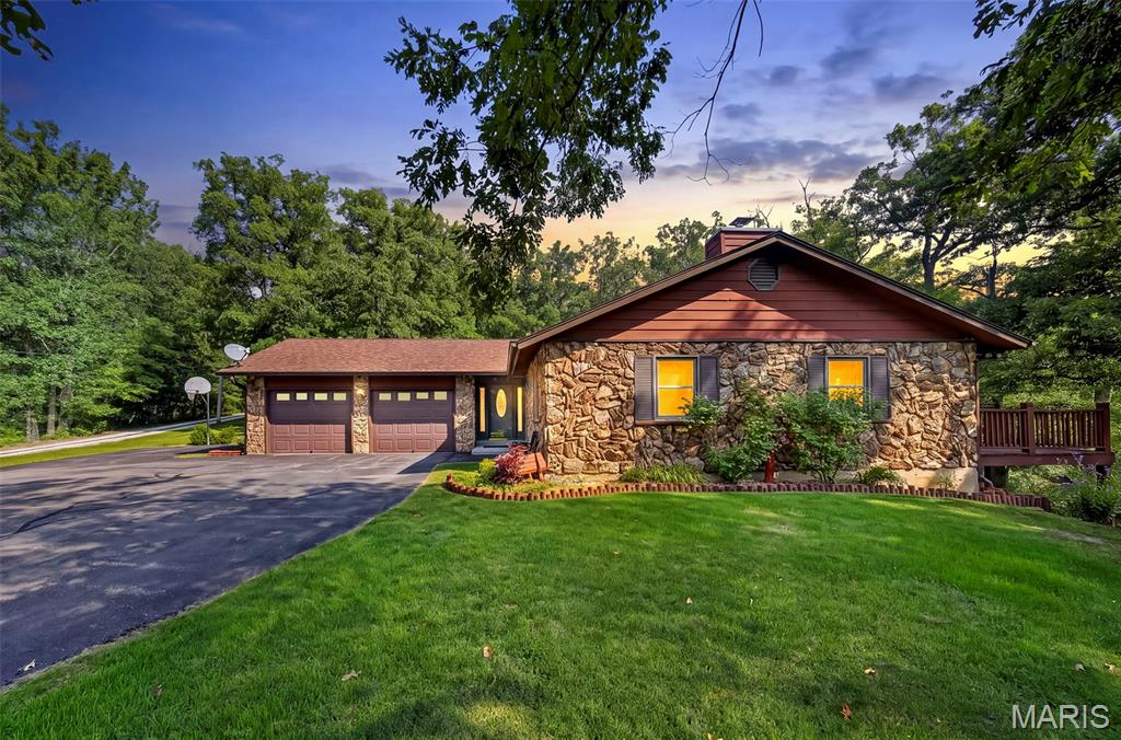 Escape to your own private retreat with this one-of-a-kind custom-built home nestled on 3.55 scenic acres. Offering 4 spacious bedrooms and 3 full bathrooms, this property is the perfect blend of peaceful country living and endless potential. Designed with versatility in mind, the home features a full second kitchen in the lower level, making it ideal for multigenerational living, extended guests, or entertaining. Cozy up by the charming wood-burning stove and enjoy the warmth and character it brings to the home. Step outside and experience everything this incredible property has to offer. Spend summer days relaxing by the above-ground pool or enjoy quiet evenings overlooking your own private stocked lake—perfect for fishing, watching wildlife, or simply taking in the breathtaking views. Surrounded by nature and offering exceptional privacy, this property is a rare opportunity to enjoy the tranquility of country living while still having room to make it your own. While the home could benefit from some cosmetic updates, its quality construction and solid bones provide the perfect foundation to create your dream home. If you've been searching for space, privacy, and a truly unique property with unlimited potential, this is one you won't want to miss!