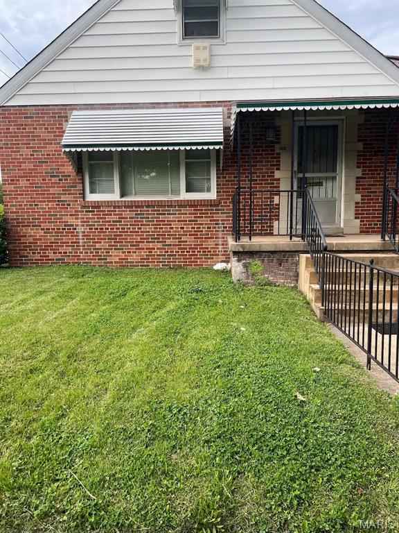 Brick bungalow in the Penrose neighborhood, built in 1955. This 2-bedroom, 1-bathroom home living space with a 1-car garage. Electrical updates include a new panel and AFCI breakers (2022); plumbing updates include PEX piping (2021) and three new plumbing stacks (2022). Solid brick construction with original character details, including a stained-glass foyer window and cedar-lined closet. Full unfinished attic offers potential for additional living space. Lower level already plumbed for an additional half bath. Sold as-is.