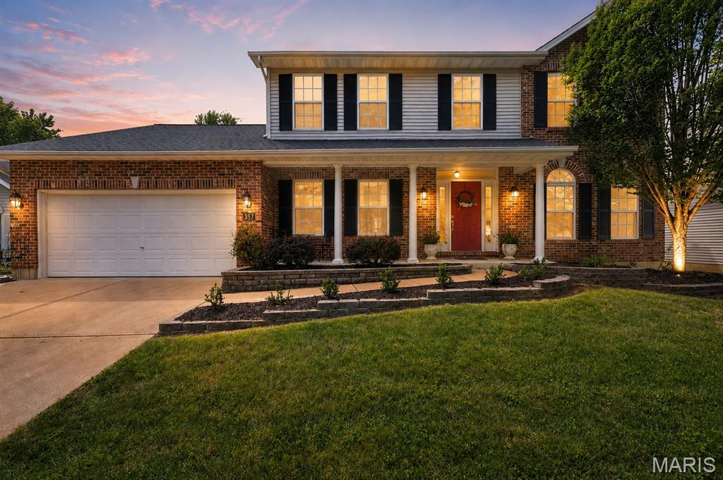 Meet Heron! He's a beautifully maintained 2-story offering nearly 2,600 square feet with 4 bedrooms, 2.5 baths, a tandem 3-car garage tucked away on a quiet cul-de-sac in Manchester’s desirable Audubon Woods neighborhood and the highly sought-after Parkway School District. He has an impressive list of recent updates including: fresh neutral paint throughout, updated lighting, and extensive kitchen and bath improvements. Step inside to an expansive foyer where rich Brazilian cherry hardwood floors, abundant natural light, and custom millwork immediately set the tone. Formal living and dining rooms offer flexible spaces for entertaining or working from home, while the inviting family room features a gas-log fireplace with custom mantel, bay window, and crown moulding. Thoughtful architectural details throughout the home include chair rail and cornices, custom shelving, a garden window, half-moon windows, and a cathedral ceiling in the primary suite. The updated kitchen combines style and function with quartz countertops, an oversized single-bowl stainless steel sink, generous center island with seating, custom cabinetry, and brand-new stainless steel appliances. A thoughtfully designed mudroom provides additional storage and convenient access to the laundry room and tandem 3-car garage. Upstairs, the spacious primary suite feels like a private retreat with a cathedral ceiling, Brazilian cherry hardwood, sizable walk-in closet, and updated bath featuring new quartz-topped double vanities, walk-in shower, and Roman jetted soaking tub. Three additional generously sized bedrooms share an updated full bath. Outside may be one of the home's greatest surprises—a beautifully landscaped, fully fenced backyard oasis designed for gardeners and entertainers alike. Relax or gather with friends on the paver patio surrounded by mature landscaping, with an in-ground irrigation system helping keep everything looking its best. Major improvements add even more peace of mind, including a new water heater in 2026, A/C in 2024, furnace in 2023, and roof in 2015. The unfinished basement provides abundant storage today and a blank canvas for future living space. With its exceptional condition, extensive updates, distinctive craftsmanship, gorgeous outdoor setting, and sought-after Parkway location, this is a home that has been thoughtfully cared for and is ready for its next chapter.
