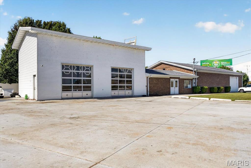 Excellent owner/user or investment opportunity in the heart of unincorporated St. Charles County in St. Peters ! This 5,347 SF freestanding commercial building sits on 0.65 acres with outstanding visibility and exposure along Interstate 70, where more than 75,000 vehicles pass daily.Currently configured as a fully operational auto body shop with a showroom, the property features a complete build-out including three drive-in garage bays, vehicle lifts, and a functional shop layout, making it ideal for automotive users or a variety of light industrial and commercial businesses.
Property Highlights. 5,347+ SF freestanding commercial building. 0.65-acre site. Zoned C-2 General Commercial District. Currently operating as an auto body shop. Three drive-in garage bays. Vehicle lifts negotiable. Functional floor plan designed for automotive operations. Outstanding Interstate 70 frontage with approximately 75,262 vehicles per day. 3 year old roof. 

Excellent owner/user opportunity with potential for a variety of light industrial or commercial uses
This highly visible location offers exceptional access, strong traffic counts, and a versatile building ready for immediate occupancy or customization to suit your business needs. Don't miss this opportunity to own a well-located commercial property in one of St. Charles County's most active business corridors.
