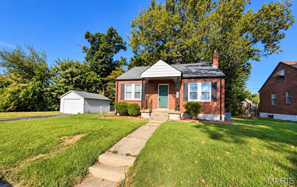 Charming, clean, and exceptionally well cared for, this 2-bedroom, 1-bath brick bungalow offers easy living in a convenient location. The open floor plan creates a bright and welcoming feel, with comfortable living and dining spaces that flow together effortlessly. Both bedrooms are nicely sized, and the home has been meticulously maintained throughout, making it truly move-in ready. The unfinished lower level provides plenty of storage along with additional possibilities for future use. Outside, the one car detached garage and off-street parking adds everyday convenience, while the solid brick exterior offers classic curb appeal. Conveniently located,this adorable home is a great opportunity for anyone looking for low-maintenance living with plenty of charm.