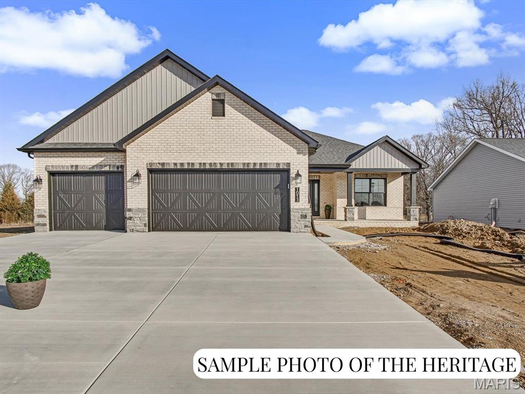 Visit the Display Home Open House at 1013 Waymaker Ln, Waterloo, IL. New Construction: Customizable "The Heritage" Plan at Silver Creek Crossing by Quantum Homes, Inc. This is a To Be Built listing, offering you the exciting opportunity to fully customize your new home! With an estimated build time of just 5-6 months, your dream home is within reach. The "Heritage" is a spacious and thoughtfully designed floor plan, The price listed reflects the standard finishes built on Lot 106. Exceptional Standard Features The base price includes a host of high-quality standard features: Welcoming Entrance: A generous-sized covered front porch and an elegant hard surface foyer. Gourmet Kitchen: Features a large island perfect for gathering, granite countertops, and a convenient walk-in pantry. Comfort & Style: A cozy gas fireplace with a marble surround and wood mantle. Everyday Convenience: A practical mud room located off the garage, complete with a nearby laundry room. Luxurious Primary Suite: Includes a large walk-in closet and an ensuite bath with a double-bowl vanity. Finished Baths: All bathrooms feature quality cultured marble vanity tops and comfortable adult-height vanities. Future Potential: An unfinished basement with a rough-in for a future bathroom and an egress window for safety and light. Outdoor Living: A three-car attached garage with auto door openers and a 12'x12' patio. Please Note: The photos and virtual tours provided are sample images only and may feature optional upgrades not included in the base price. (Agent related to seller.) Ready to design and build your new home? Call today to choose the perfect lot and schedule your comprehensive home building consultation!