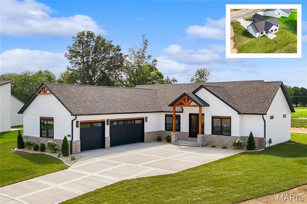 Introducing the first-ever BIRCH floor plan by MJ Holland—an exclusive opportunity in O’Fallon, IL. This architecturally distinctive custom ranch offers approx. 3,263 sq ft of luxury living, blending timeless craftsmanship with modern design.

A private courtyard entry leads to an open-concept layout featuring 4 bedrooms, 3.5 baths, soaring vaulted ceilings, luxury vinyl plank flooring, and designer finishes throughout. The gourmet kitchen showcases quartz waterfall countertops, an oversized island, custom walk-in pantry, premium cabinetry, and seamless flow into the vaulted great room with a striking fireplace feature wall. The primary suite is a private retreat with a tray ceiling, spa-style bath with dual vanities, zero-entry tiled shower, private water closet, and expansive walk-in closet. Two secondary bedrooms share a well-designed Jack-and-Jill bath, with a convenient powder room on the main level. The finished lower level expands living space with 9’ ceilings, a large rec room, custom wet bar, fourth bedroom with walk-in closet, and full bath—ideal for entertaining or guests. Built for efficiency and comfort with 2x6 construction, Quaker windows, high-efficiency HVAC, tankless water heater, irrigation system, covered patio, and oversized 3-car garage. Located in the highly rated O’Fallon Township High School District, this home delivers exceptional design, quality, and location. Schedule your private showing today.