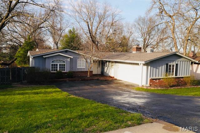 Showings begin at 2:00 pm 3/28/2026 --Buyers/agents can park in driveway and additional parking available at the Middle School lot.  Be patient as there are a lot of overlapping showings.

You will absolutely fall in love with this beautifully updated open concept 3 bed, 3 bath ranch home in the sought after Lindbergh School district. So much to LOVE!
  
Snuggle up in the cozy family room featuring a wood burning fireplace, and hardwood floors.  A separate main floor living room/family room has gorgeous views out to the wooded back yard.  The home features a very spacious master bedroom suite with fabulous, fully updated bath along with 2 other main floor beds and one bath.

The kitchen has just been updated with new cabinets, countertops, backsplash and new stainless steel appliances.

Entertain your family and friends in the large updated HEATED pool surrounded by a quiet, fenced back yard with a patio and upper level deck.

Completely renovated lower level walk-out with sports bar, TV/Entertainment area, dining area and extra possible 4th bedroom/office space/playroom.

Newer roof, systems and updates make this home a must see--Don't wait to make this house your new home.