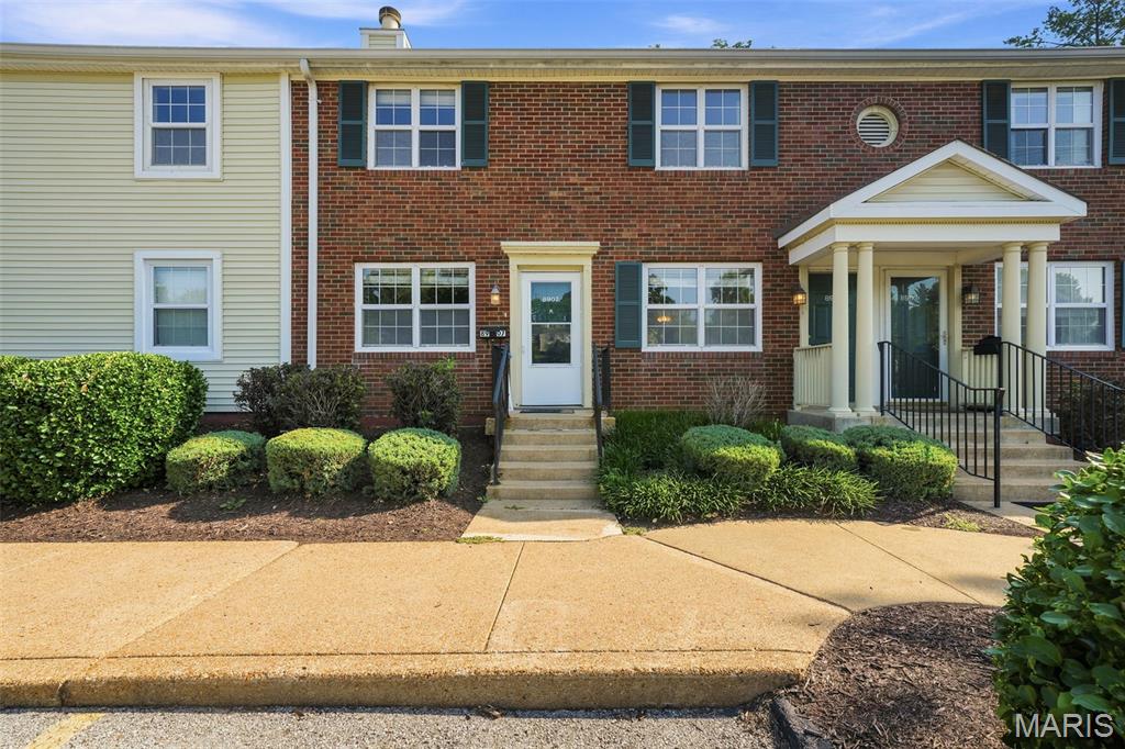 DRASTIC PRICE REDUCTION! CONDO WITH A VIEW! - Exceptional value for a lake view in Brentwood Forest!
This gorgeous end unit sits directly across from the lake and fountain, offering peaceful views and incredibly convenient, low-step entry (only 5 half steps with dual handrails to the front door). Boasting 1,118 sq. ft. of turn-key living space, this is one of the largest layouts in the complex! Step inside to a freshly painted, spacious floor plan flooded with natural light. The great room features a cozy wood-burning fireplace and a massive storage closet. The dining room includes a sliding door to your private back patio—the perfect spot to enjoy summer nights. The masterfully updated kitchen highlights custom cabinets and stainless-steel appliances. Both large bedrooms boast ample closet space and share a beautifully updated bathroom. Extra storage room off the patio, plus washer, dryer, and refrigerator stay! Enjoy Brentwood Forest amenities: lakeside trails, tennis courts, two pools, walking paths, and immediate building access to open parking bays. Walk to shopping/dining with easy access to major highways, Clayton, WashU, SLU, and Downtown St. Louis. Schedule your showing today!