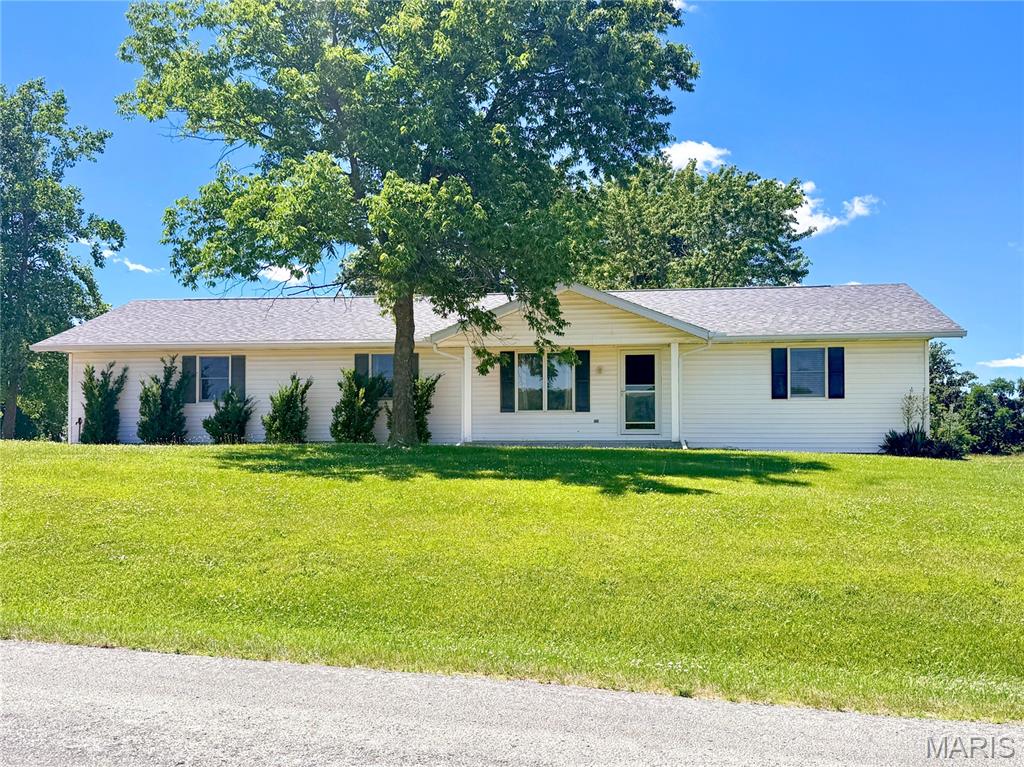 Country living at its finest on 10 scenic acres!  Nestled in Leonard, Missouri, this beautifully updated 3-bedroom, 2-bath home offers the perfect combination of comfort, recreation, and rural charm!  Whether you're dreaming of a hobby farm, horse property, small cattle operation, or simply more space to enjoy the outdoors, this property is ready to fit your lifestyle!

The current owners have completed extensive updates throughout the home, including a new roof, furnace, central air unit, water heater, flooring, ceiling fans, light fixtures, exterior doors, guttering, and fresh paint.  The spacious kitchen comes fully equipped with stainless steel appliances, including a refrigerator, gas stove, dishwasher, garbage disposal, washer, and dryer, all of which can convey with the sale. 

Relax on the screened-in porch featuring a ceiling fan and peaceful country views, or unwind around the fire pit after a day outdoors.  The property includes two stocked ponds, hay ground, a garden area, apple trees, and ample open space that can easily be fenced for horses, cattle, or other livestock.

The full unfinished basement provides abundant storage and excellent potential for additional living space.  For added peace of mind, Foundation Recovery Systems professionally repaired and waterproofed the basement with wall sealing, a sump pump, dehumidifier, and interior drainage system. The transferable lifetime warranty offers exceptional value and confidence for future owners.

A 1-car attached garage and a 28' x 30' detached garage/shop provide plenty of room for vehicles, equipment, hobbies, and projects.  From fishing in your own stocked ponds and tending a garden to raising livestock or simply enjoying the scenic surroundings, this versatile acreage offers endless opportunities to embrace the country lifestyle.  Schedule your private showing today!