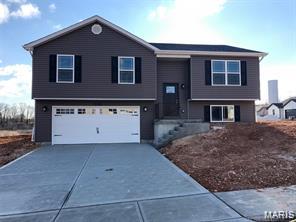 BRAND NEW home with every option you could imagine! They include vaulted ceilings, rounded “bullnose” corners, granite or quartz countertops, stainless steel appliances, 42" cabinets with "cushion close", custom neutral-colored paint job throughout, LVT flooring throughout most of the home, framed windows, taller baseboards, adult-sized cabinets in bathrooms with marble countertops, walk-in closets, upgraded carriage garage doors with openers on 2 CAR Garage, full bath rough-in, panel doors (many varieties), and upgraded water/light fixtures throughout the house! MAIN FLOOR laundry! Fully sodded yard (front/sides/back). *Pictures are of previously built homes. Builder/Broker* This home is USDA eligible.