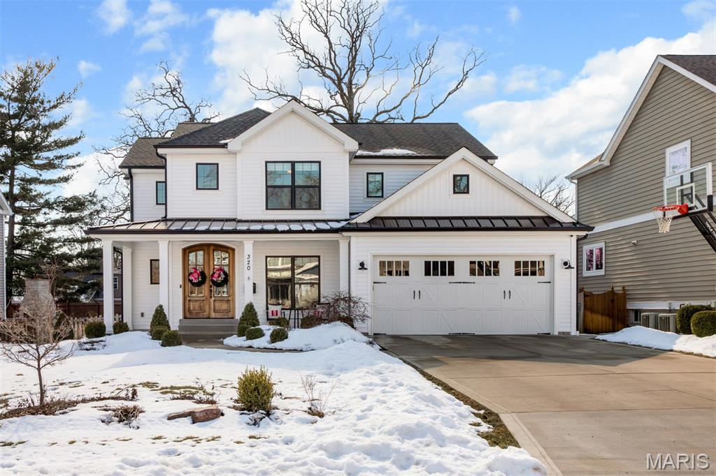 Exceptional custom-built Mike Lewis home completed in 2020 with easy walk to downtown Kirkwood.  The open floor plan showcases custom millwork and built-ins throughout.  The main level features a gourmet kitchen with quartz countertops and a walk-in pantry opening to the family room with fireplace, along with a formal dining room ideal for entertaining.  

Upstairs are four generous bedrooms, including a luxurious primary suite with tray ceiling, dual walk-in closets and a spa-inspired custom shower.

One of the nicest lower levels you will find, featuring a restaurant-quality bar and counter top, family room, full bath and an additional fireplace.  A fifth bedroom is easily achievable with an existing egress window and walk-in closet already in place.  Additional highlights include an oversized two-car garage and a private backyard with both covered and uncovered parties, plus a built-in firepit (currently wood-burning with gas line stubbed for conversion).  

Notable upgrades include:
Generac whole-home generator
Primary shower features dual rain heads, four body jets and hand-held wand.
Dedicated hot water heater for the primary shower.
Wood flooring throughout the main and second floors (no carpet) with tile in upstairs baths and laundry.
Custom closets (primary, another upstairs) and pantry by St. Louis Closet Company.
In-ground sprinkler system.
Trimlight permanent decorative exterior lighting with transferable warranty.

This home seamlessly blends luxury, functionality and curb appeal in one of Kirkwood’s most desirable locations.