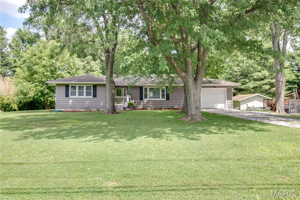 Enjoy the perfect blend of country living and convenience in this beautifully updated 3-bedroom, 2-bath ranch just minutes from town. This move-in-ready home offers modern updates throughout while maintaining a warm, welcoming feel. The spacious kitchen features french doors that open to a large deck and above-ground pool, both new in 2022, creating the perfect space for relaxing or entertaining. The finished lower level provides additional living and entertaining space, complete with a full bathroom and ample storage. For added peace of mind, the home has been professionally waterproofed, with a sump pump, by Woods Basement Systems (2022). Laundry hookups are available on both the main floor and in the basement, offering flexibility to fit your needs.

If you're looking for the tranquility of country living with easy access to town amenities, this updated ranch is one you won't want to miss!