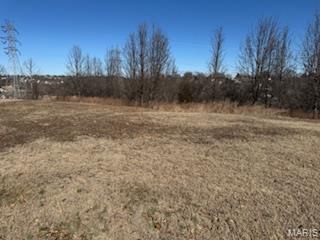 Great place for builders to either build one large home, 2 home, 3 homes or 2 sets of villas.  All utilities are at the street.  To do have to pay the to hook-up fees.  The property has some amazing views.   You must see .  Please call listing agent for additional information.