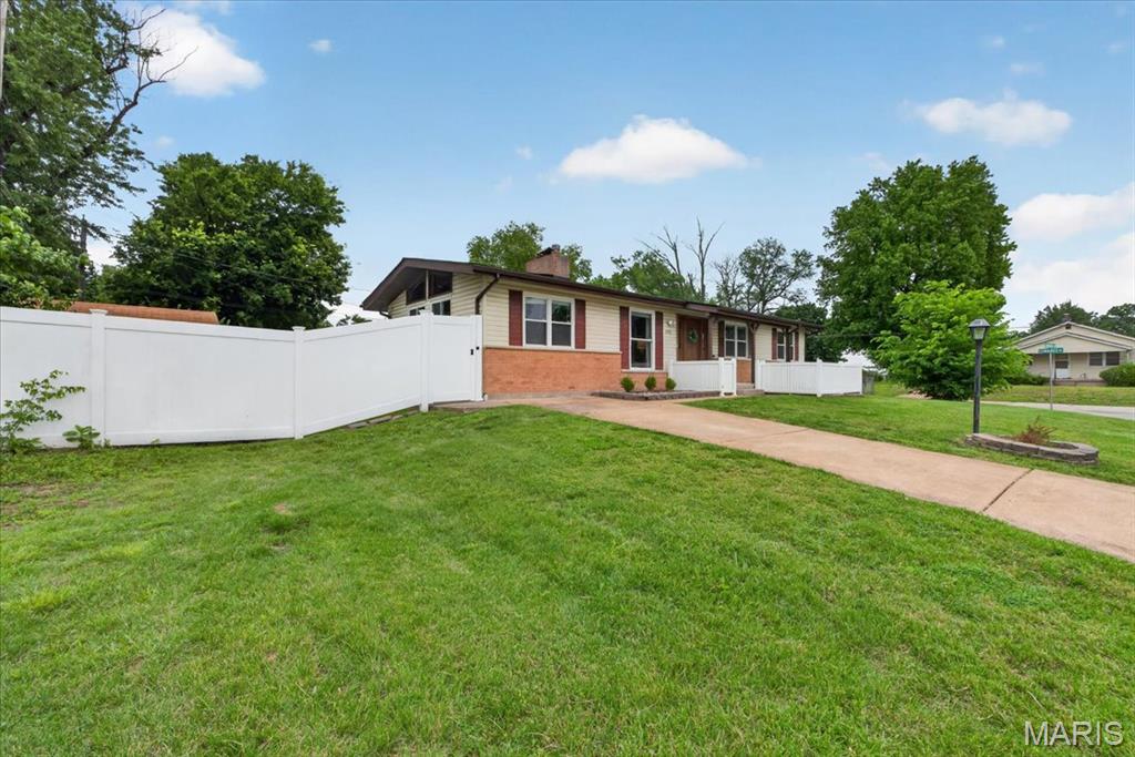 A refreshed South County ranch on a level corner lot, thoughtfully updated for easy living and flexible space

Vaulted ceilings and natural light set the tone from the moment you step inside. The kitchen is anchored by granite countertops and a full appliance package, elevated by painted cabinetry and a replaced backsplash in 2026, plus a new dishwasher and microwave in 2026 and a new oven in 2024. The dining area flows naturally into the den, where a wood burning fireplace adds warmth and character.

Three bedrooms and two full baths are located on the main level, offering a practical layout that lives well day to day. Recent improvements include upgraded bathroom faucets in 2026 and a refinished bathtub in 2025. New blinds in 2025 and carpets professionally cleaned in 2026 support a clean, move in ready presentation.

Downstairs, a partially finished lower level with recessed lighting adds valuable bonus space for a recreation room, workout area, or organized storage, plus basement laundry. Outside, new landscaping in 2026 enhances curb appeal, and the back patio overlooks the fenced yard and storage shed, creating a simple, functional outdoor setup.