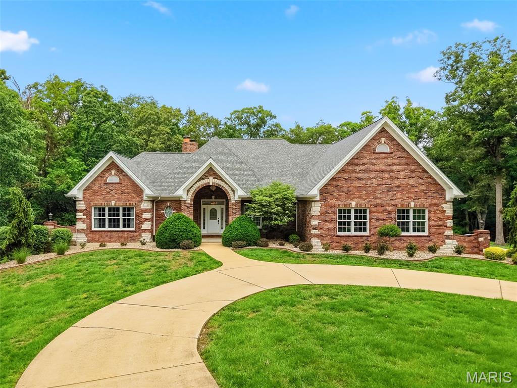 Welcome home to this beautifully appointed brick ranch that truly has it all—inside and out. Situated on approximately 10+/- acres, this property offers the perfect blend of privacy, space, and resort-style living. Step into your own private backyard retreat featuring a stunning in-ground saltwater pool (9.5 ft deep), complete with heating and cooling for extended seasonal enjoyment. The surrounding patio provides ample space for entertaining, complemented by a large cedar deck, outdoor lighting, and a dedicated firepit area—perfect for relaxing evenings. A designated playground area adds even more versatility to the outdoor space. Inside, you’ll find an inviting open floor plan highlighted by a striking beamed ceiling and a spacious great room with a cozy wood-burning fireplace. The chef’s kitchen is a standout, showcasing custom cabinetry, under-cabinet lighting, a pot filler, expansive center island, and a stylish bar area with a built-in refrigerator—perfect for hosting. The luxurious primary suite is designed for comfort and relaxation, featuring a coffered ceiling, gas fireplace, dual closets, and a spa-like bath with dual vanities and a standalone soaking tub. Additional features include a potential home office, oversized garage, and a convenient main floor laundry room with sink and built-in cabinetry. The finished walk-out lower level significantly expands your living space, offering an additional bedroom, sleeping area,  a full bath, spacious recreation room, and bar area—plus a storage room for added convenience. Step directly outside to the pool area, making this level ideal for entertaining and guest accommodations alike. This exceptional home combines high-end finishes, functional design, and incredible indoor-outdoor living on acreage—ready for you to enjoy.