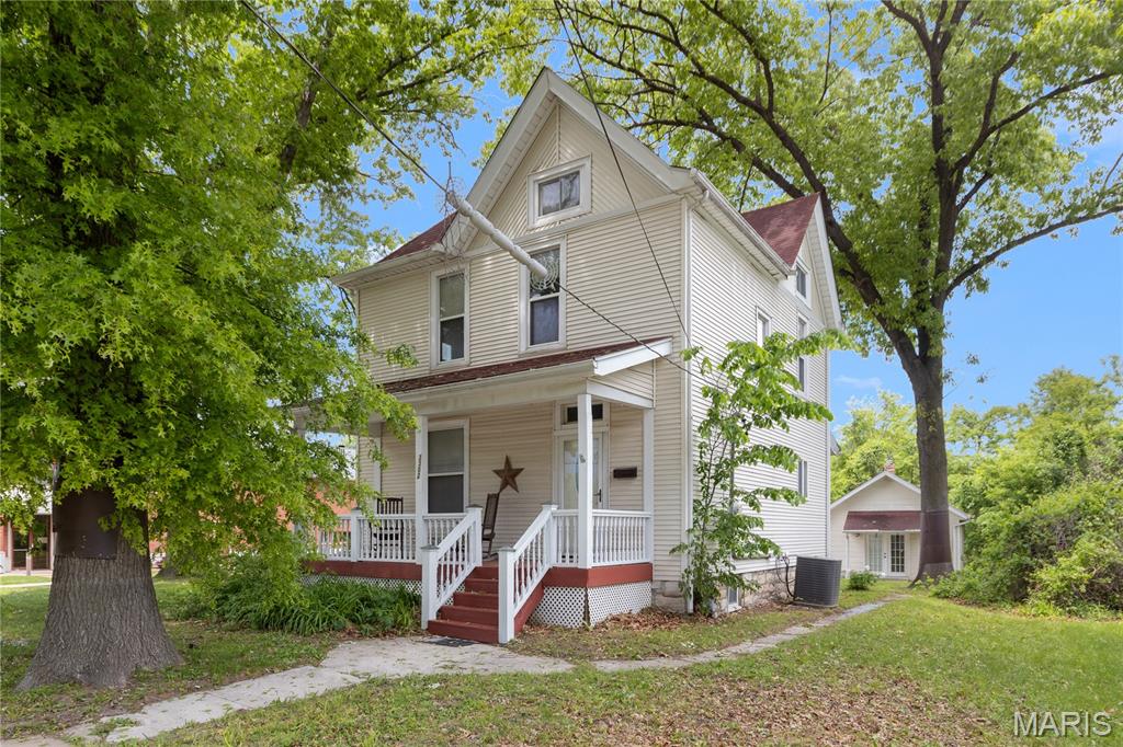 DON'T MISS THESE TWO HOUSES IN ONE! Experience the charm and character of a bygone era in this unique two-story home, built in 1907/ and extra carriage house/  located in the heart of Alton, Illinois. Just a short walk from the SIUE Dental College, this property perfectly blends historic character with modern convenience.

Main House Features:
* Main Floor laundry

* Three spacious bedrooms located upstairs, providing ample living space.

* Two bathrooms: a full bath upstairs and a convenient half bath on the main level.

• Beautiful original hardwood floors that add warmth and charm.

* Updated windows and wiring, ensuring energy efficiency and peace of mind.

Carriage House:
* 468 square feet of extra living space

* A cozy one-bedroom, one-bath suite, ideal for a teenager, guest, or mother-in-law.

* Offers privacy while still being part of the main property.

The property also includes a handy shed for storing lawn equipment and tools. Step back in time and enjoy the unique character of this historic home, where modern amenities meet classic design. Don’t miss your chance to own a piece of Alton’s history! Home is being sold in "as is" condition. Seller will not pay for an occupancy inspection or provide an occupancy permit.