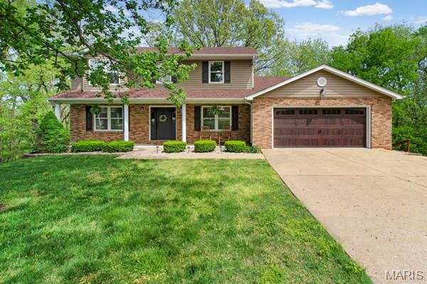 Welcome home to this beautiful move in ready home on a private street just minutes from I 55, parks, shopping, and restaurants.

Inside, you will find a vaulted entry with a beautiful staircase and chandelier, a brick fireplace with built in bookshelves, and a functional layout with plenty of space. Upstairs offers three spacious bedrooms, including a large primary suite with a soaker tub. The finished basement adds a fourth bedroom, a bathroom, and excellent storage, including a 21 x 21 concrete room under the garage that is perfect for a workshop, storm shelter, or extra storage.

Outside, enjoy two porches overlooking 30 plus acres of common ground. A two car garage and concrete storage shed complete the property. If you’ve been looking for a move in ready home with modern updates, a convenient location, and a private setting, this is it!