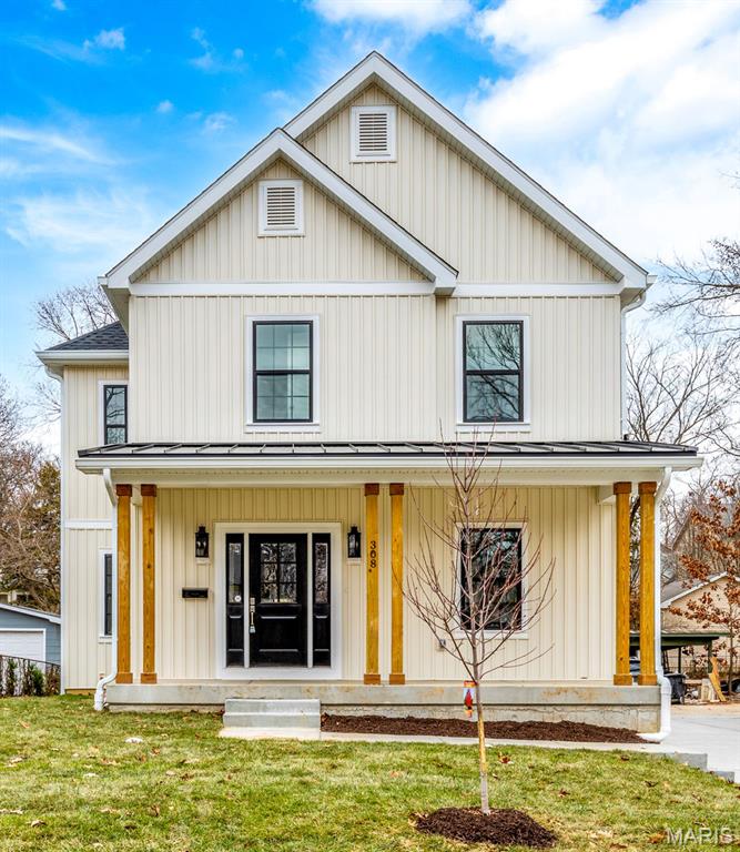 Beautifully nestled in desirable Kirkwood, this stunning five-bedroom, five-bath new built  home showcases exquisite craftsmanship, light-toned wood flooring, and designer finishes. What truly sets this home apart is its perfect balance of defined living spaces and open-concept flow. The main level features an office/living space, a separate dining room, and a spacious family room with a gas fireplace. The chef's kitchen impresses with a large center island, quartz countertops, a porcelain farm sink, custom cabinetry, a six-burner gas range with a wood hood, and an expansive walk-in pantry with additional storage. A convenient mudroom sits off the back of the home, and laundry rooms are located on both the main and second floors. Upstairs, each bedroom offers a walk-in closet and direct access to a bathroom. The luxurious primary suite features a private toilet room, a soaking tub framed by dual custom vanities, and a walk in shower.  Bedrooms two and three share an impressive dual-entry Jack-and-Jill bath, while bedroom four includes a private en suite.  The finished lower level adds even more living space (1055 sq ft) with luxury vinyl flooring, a full bedroom and bath, and a showstopping bar area perfect for entertaining. Additional highlights include a detached two-car garage and zoned HVAC. Enjoy all the amenities and charm that living in Kirkwood has to offer.