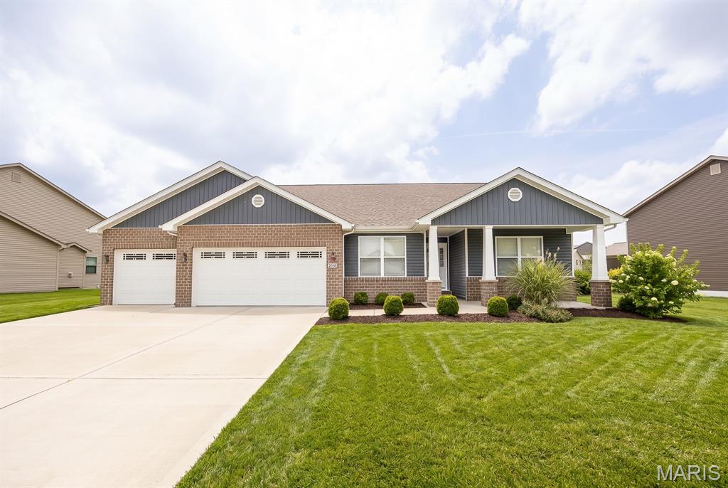 If you've dreamed of living in the highly sought after Villages at Wingate neighborhood, don't wait to visit this beautiful home. The perfect location features all the amenities and conveniences of living in Shiloh (think Target and Walmart, restaurants galore, coffee shops nearby and minutes to Scott Air Force Base) AND - MASCOUTAH School District+Wingate Elementary. Stepping inside, you'll immediately fall in love with the neutral color palette & split bedroom floorplan. The entry way is perfect for decorating and leads to 3 nice sized bedrooms and main bathroom. The spacious chef's kitchen features a large island with plenty of space for seating, stainless appliances, beautiful cabinets, and loads of granite counter space for prepping and serving. The cozy living room opens to the kitchen and dining area - entertaining will be a breeze! The primary bedroom suite is situated at the back of the home featuring a bathroom fit for royalty - dual sinks, separate soaking tub, large shower, and HUGE walk in closet. Step out to the backyard to enjoy your morning coffee watching the sunrise or grill a delicious meal. A dropzone area with (separate laundry room) leads to the spacious 3-car garage that is plenty big for your vehicles and storage! The HUGE unfinished basement is waiting for your personalizing touch and offers more than enough space to add additional living space and plenty of storage. The solar panels are owned and can provide additional energy savings. Don't let this stunning home with a perfect location slip away!