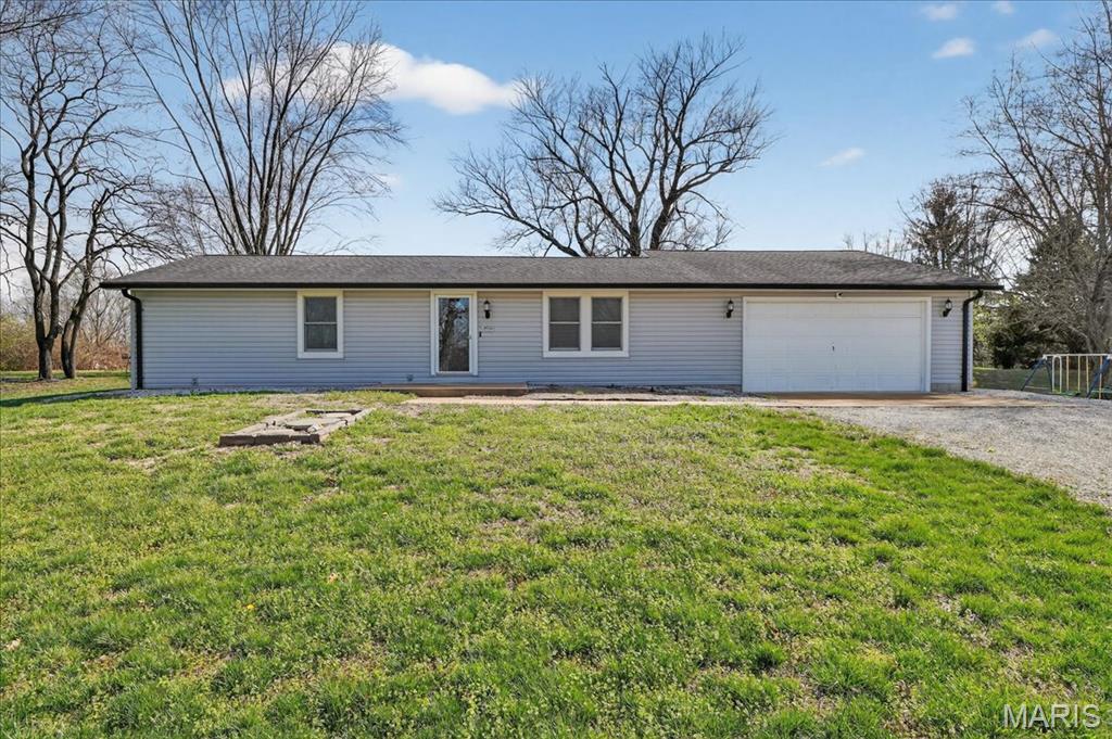 Welcome to 3450 Helena Acres Dr! This charming, well-maintained home sits on a spacious one third acre lot, offering plenty of room to relax, entertain, and enjoy the outdoors. Newer paint and updated flooring throughout give the home a clean, move-in-ready feel.
Step inside to the generous living room that flows seamlessly into the kitchen and breakfast room, creating a comfortable space for everyday living and gatherings. The kitchen features ample cabinetry, updated appliances, and great workspace for cooking and entertaining. The sunny breakfast room opens directly to the patio, making indoor-outdoor living easy.
The main floor primary suite offers a huge walk-in closet, additional built-in cabinetry, and the convenience of main floor laundry. The updated primary bath includes a tub/shower combo and plenty of storage. A second bedroom also features a large walk-in closet, while the third bedroom—located just off the garage—offers flexibility and could easily have its own private entrance.
The oversized garage provides excellent storage and workspace. Outside, enjoy the expansive backyard with a patio, deck area, and storage shed, plus plenty of space to spread out on the large lot.
Additional highlights include Anderson windows, updated lighting, newer flooring and paint, as well as roof, siding, gutters, patio and deck that have been updated over the years. The home sits on a graveled crawl space with new sump pump and lighting for easy access and maintenance. See the additional feature sheet for a full list of updates!