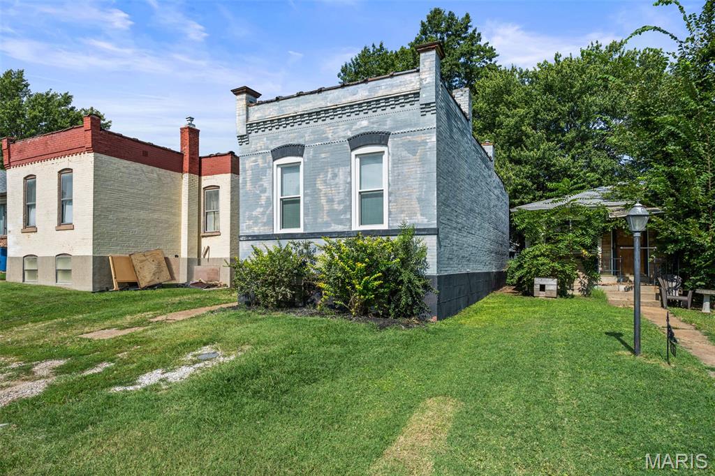 This two-bedroom, one-bathroom bungalow in the heart of 63125 offers a great combination of updates and value. As soon as you walk in you’ll notice the freshly painted interior and inviting family room with beautiful hardwood floors. The primary bedroom features tall ceilings and an abundance of natural light, while the newly renovated bathroom adds a fresh, modern touch. The kitchen and second bedroom both have new luxury vinyl flooring. The eat-in kitchen is bright and functional, with tall ceilings, stainless steel appliances and plenty of cabinet space. The refrigerator, washer, and dryer are all included, adding an extra convenience for the new homeowner. All of the windows are brand new, and the HVAC and water heater are newer, giving you most of the bigger systems already taken care of. Outside, the covered deck and fenced backyard create a great spot for relaxing evenings or backyard BBQs. There is also room to park at least two cars behind the back fence, with convenient alley access. With off-street parking, new windows, newer major systems, an updated interior and appliances included, this home offers a lot for the price and is a great opportunity for a first-time home buyer, downsizer or investor. This convenient location has easy access to Highway 55 and 270, is just minutes from Jefferson Barracks Park, and the Great Rivers Greenway at Grant’s Trail. Come see all of the things this home has to offer. Buyer to verify square footage and school district.