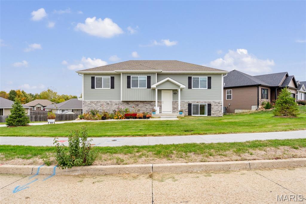 Welcome to your NEW Move-In Ready Home! This stunning 3-bedroom, 3-bath residence offers 1,638 sq ft of thoughtfully designed living space in the desirable Tuscany Ridge Subdivision in Columbia, MO. Perfectly positioned against the scenic 50-acre Smith Park, enjoy peaceful views, walking trails, and direct access to nature close by. The bright open floor plan seamlessly connects the living, dining, and kitchen areas—ideal for both entertaining and everyday living. The kitchen includes all stainless-steel appliances, refrigerator, range, microwave, and dishwasher. Sellers have added numerous upgrades, including custom blinds, built-ins, deck awning, bluegrass sod, re-carpeted stairs, professionally finished lower level with a family room and full bath, and professional landscaping. The gentle corner lot provides a spacious backyard perfect for play or relaxation, plus a 2-car garage for convenience. Located just minutes from Hwy 70 and Hwy 63, this home offers the perfect blend of comfort, style, and accessibility. Don’t miss this incredible opportunity! Seller offering a $2500 buyer incentive for closing costs, repairs, buy down points, etc.