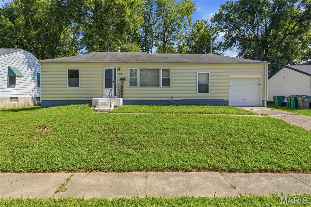 Don't miss this inviting 1-story home featuring 2 bedrooms, a 1-car attached garage, and a full, unfinished basement, offering a comfortable layout with plenty of potential. The functional floor plan provides welcoming living spaces and the flexibility to fit a variety of lifestyles, while the full basement offers excellent storage or future finishing possibilities. Whether you're looking for your next home or an investment opportunity, this property is ready for your personal touches. Schedule your showing today and discover everything this home has to offer! One or more photos may have been virtually staged, AI generated, or digitally enhanced to illustrate the property's potential.