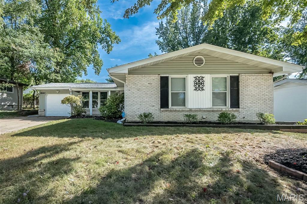 Spacious ranch with 3 beds and 2 full baths, wonderful curb appeal and a welcoming front porch. Step into the spacious entry foyer which leads to the living room , formal dining room and also the family room with a fireplace. Newly finished hardwood floors throughout, bright kitchen leading out to a covered patio and fenced backyard. The lower level features a walk up, rec room and a sleeping area/den. Lots of space left for storage. Great opportunity for home ownership located near the Highway and Parks.