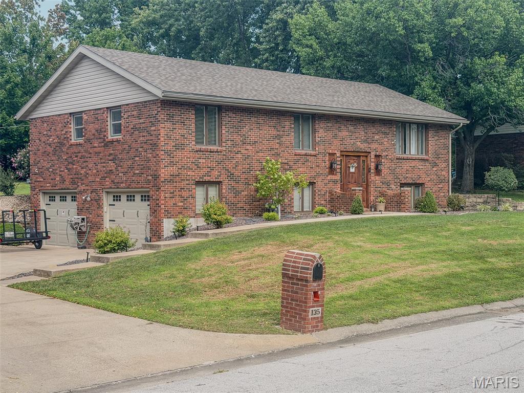 Welcome to 135 Pioneer Trail, a spacious 3-bedroom, 3-bath home in a desirable and conveniently located Hannibal neighborhood. Recent improvements include newly updated basement flooring and paint, giving the lower level a fresh look and plenty of possibilities for additional living or recreation space. One of the highlights of the home is the beautiful sunroom, offering a bright and inviting space that could easily serve as a home office, sitting room, playroom, or additional living area. With a functional multi-level layout, generous living spaces, an attached garage, and a great location close to shopping, schools, dining, and everyday conveniences, this home offers plenty of room to make it your own. Schedule your showing and come see all that 135 Pioneer Trail has to offer!