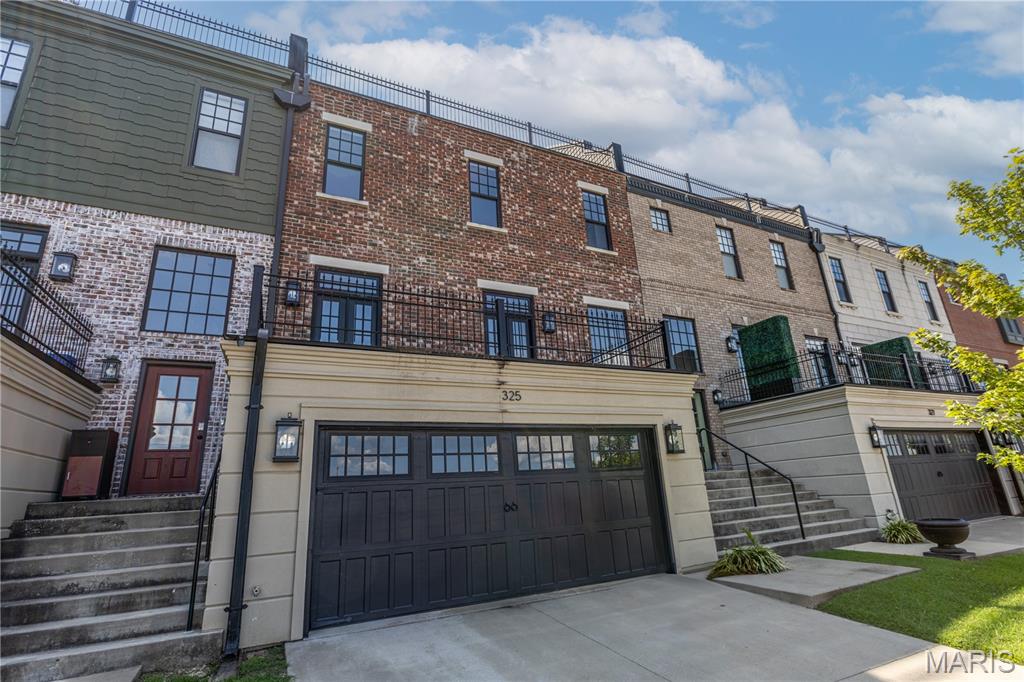 Downtown living with a Mississippi River view—and room for six cars? This Cape Girardeau townhome offers a combination you simply don’t find every day. Enjoy beautiful views of the Mississippi River while living within walking distance of downtown restaurants, shops, entertainment, and the riverfront, with Southeast Missouri State University just minutes away. An elevator makes moving between levels effortless, while the oversized garage provides space for up to six vehicles—an incredible find in a downtown setting and ideal for a car collection, hobbies, storage, or simply having room to spare. Whether you love the energy and convenience of downtown, want to be close to the university, or have always imagined coming home to views of the river, this property delivers a lifestyle that is uniquely Cape Girardeau.