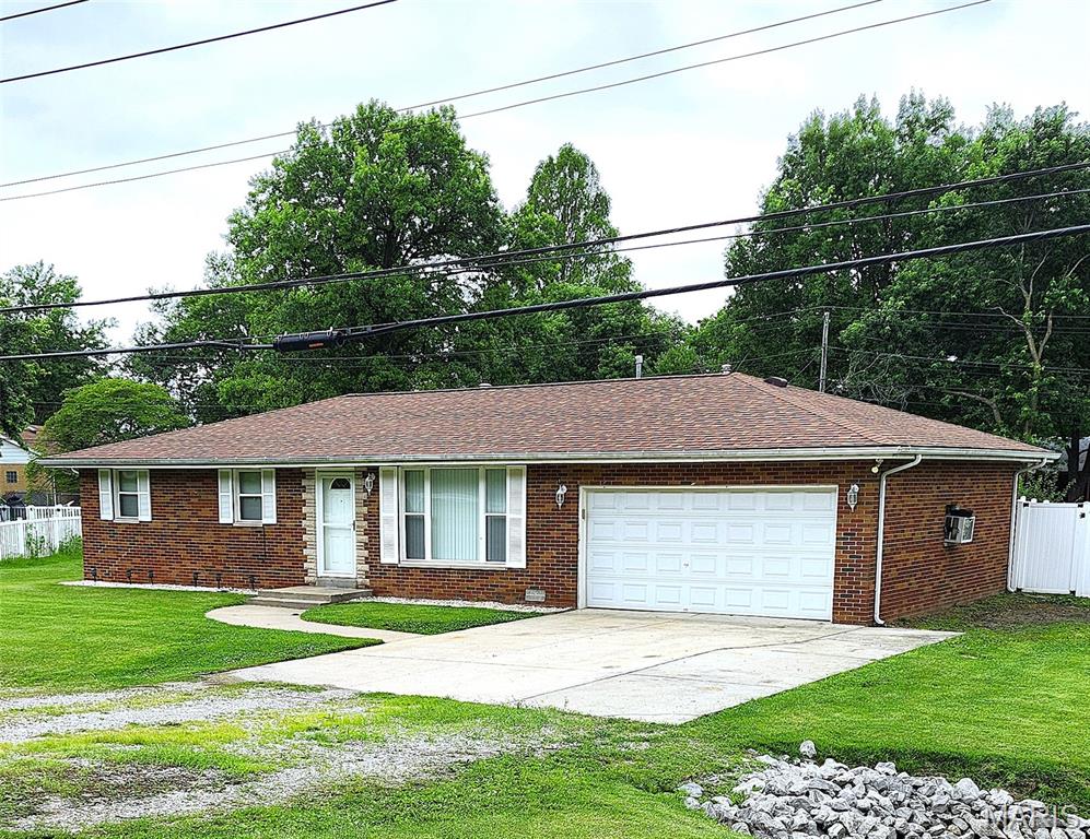 3 bed - 2 bath brick ranch home located Just outside the city limits. This property offers an attached 2 car garage, large driveway with extra parking and an oversized privacy fenced backyard featuring a newer above ground pool (2023), attractive painted deck (2025) and a handy storage shed. Other improvements include a new roof & water heater in 2024.  There's also a GENERAC whole house generator for emergency situations. The crawlspace was encapsulated in 2020 and upgraded with a double sump & dehumidifying system.  Eat in kitchen with plenty of room for a dining table, AND the appliances are included. The primary bedroom boasts its own private half bathroom.  Two more generous sized bedrooms, a full hallway bathroom and a convenient laundry room complete the rest of the home. Super close access to the Interstate & highway. 30 minutes from Scott AFB and 20 minutes from downtown St Louis.