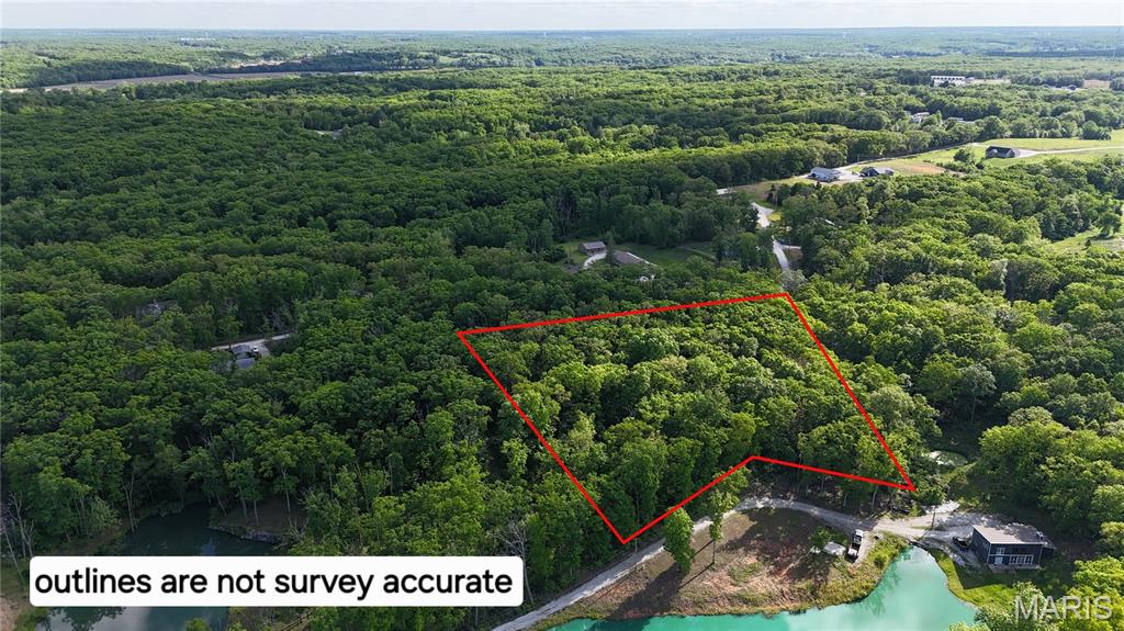 Build your dream home on this beautiful 2.31± acre parcel in Lincoln County, located within the sought-after Wright City R-II School District. This gently wooded lot offers a perfect blend of privacy and natural beauty, with mature trees providing a picturesque setting for your future home. Surrounded by well-maintained, established homes, you'll enjoy a peaceful country atmosphere while still being just minutes from modern conveniences. Located approximately 10 minutes from town and I-70, this property offers an ideal balance of rural living and easy commuting access. Bring your building plans and create the home you've always envisioned in this desirable location!