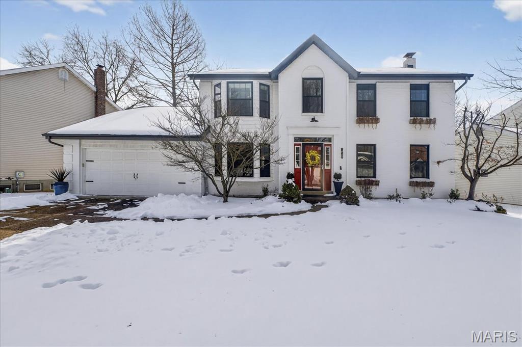 Welcome to a beautifully maintained two-story residence in the highly sought-after New England Village, offering four bedrooms, three and a half baths, and a thoughtfully designed layout that balances elegance and livability. The expansive living room is anchored by a wood-burning fireplace and opens seamlessly to a generous screened-in porch—an inviting extension of the home, ideal for entertaining or unwinding while overlooking the private and fully fenced backyard. The kitchen is both functional and stylish, featuring a center island, stainless steel appliances, and newer wood flooring that flows effortlessly into the dining room, creating a warm, cohesive space for everyday living and memorable gatherings. Upstairs, the primary suite is a true retreat, complete with a walk-in closet enhanced by custom organizational shelving and a private spa-like bath with dual vanities, a separate shower, and a soaking tub. Three additional bedrooms and a full bath complete the upper level. The finished lower level expands the home’s versatility with a spacious family or recreation room, an additional sleeping area, a full bath, and an unfinished workspace and utility room—perfect for guests, hobbies, or a dedicated home office. An oversized two-car garage adds exceptional functionality with a built-in workbench, cabinetry, and ample space for storage or projects. Recent major updates include a new roof and gutters (2025), furnace (2022), air conditioning (2020), fencing and retaining wall (2021), and a custom primary closet (2021), offering both peace of mind and long-term value. Residents enjoy access to New England Village amenities including a neighborhood pool, clubhouse, and tennis courts. Move-in ready and meticulously cared for, this home effortlessly blends comfort, thoughtful updates, and an exceptional sense of community.