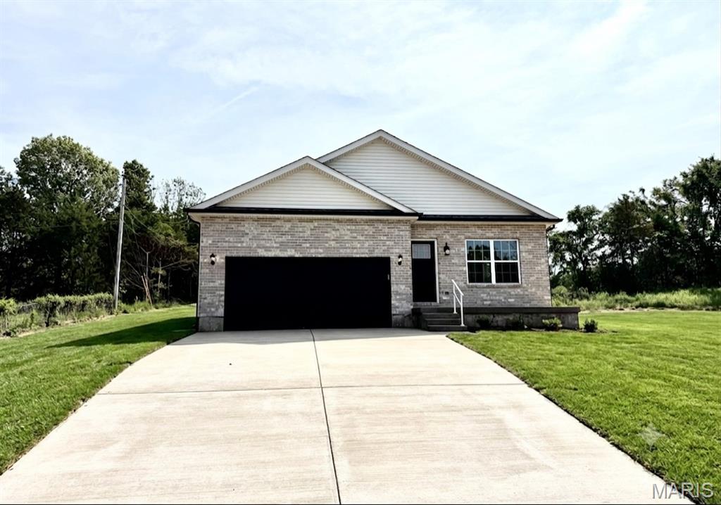 This newly constructed custom built ranch home is situated on over a .42 acre lot in the Festus School District. This home features exceptional build quality and high end upgrades that you won't find in other new builds in this area. This energy efficient home features a top of the line HVAC for an extremely low electric bill. All the interior walls throughout the home are insulated for noise reduction and privacy.  This floorplan offers 3 bedrooms and 2 full bathrooms on the main level. When you walk inside you'll notice the beautiful vaulted ceilings and luxury vinyl plank flooring throughout the open concept living area. The kitchen is thoughtfully designed with a large center island for dining, granite countertops, upgraded soft-close cabinetry, large pantry, and stainless steel appliances.  9 foot ceilings throughout. Main floor laundry room. The primary suite features two closets and a double vanity sink.  The unfinished lower level offers excellent potential for additional future square footage with a rough in bath and 2 egress windows. For extra peace of mind, the basement also includes a sump pump & pit and a 5 year waterproofing warranty. Attached 2 car garage.  2-10 builders warranty included. Enjoy hanging out at the subdivision pool and pavilion in the warmer months. Sod will be installed in the front yard before closing. Property is located in an USDA eligible area which qualifies for 100% financing.