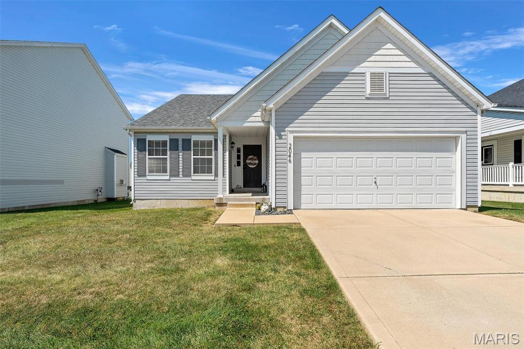 Bright and inviting ranch with an open floor plan and spacious living areas. The vaulted great room flows into the dining area, currently used as a home office. The kitchen features 42-inch cabinets, quartz countertops, built-in microwave, and smooth cooktop, with a breakfast area leading to the patio and fenced, level backyard. Main-level primary suite includes a private bath with double vanity, plus two additional bedrooms, guest bath, and main-floor laundry. Full basement and low-maintenance vinyl siding. Conveniently located near highways and shopping, with neighborhood pool, playground, and clubhouse.