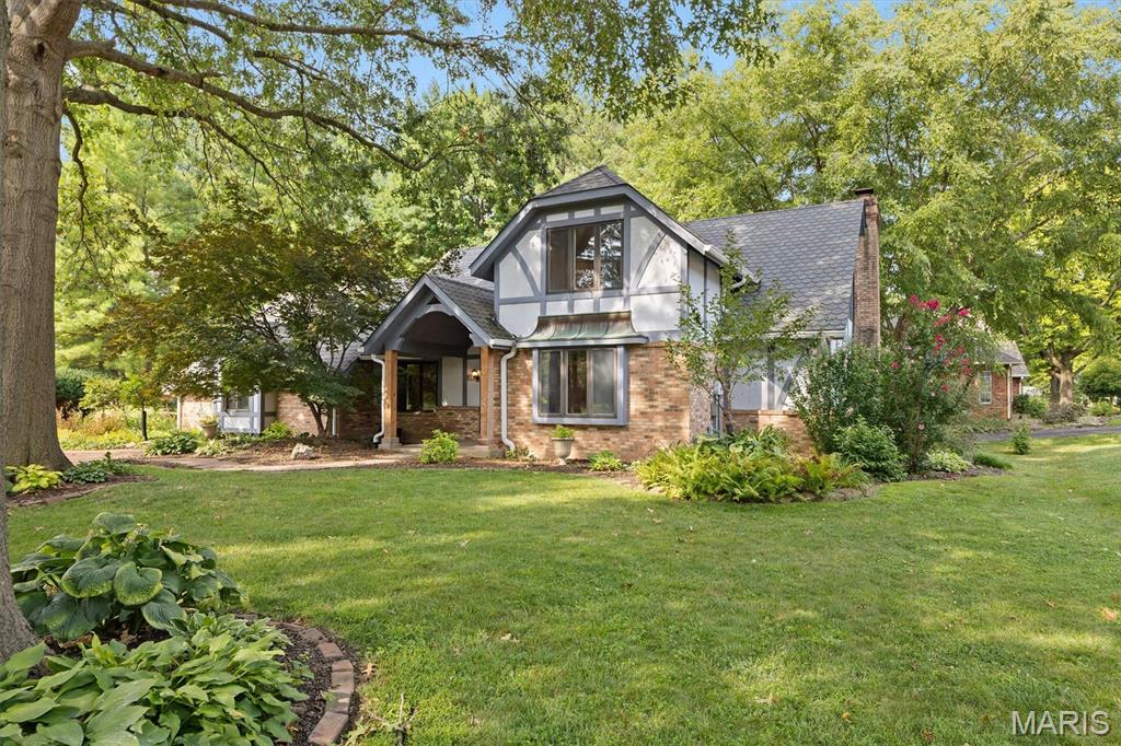Set in a quiet, private cul-de-sac, this beautifully updated home immediately feels serene and welcoming. Fresh landscaping, new cedar porch pillars, a side-load garage with extra parking, and two spacious decks create the perfect first impression. Inside, a bright 2-story foyer with abundant natural light, new LVP flooring, and fresh paint sets the tone. A flexible office/sitting room sits just off the entry. The remodeled kitchen features quartz countertops, glass tile backsplash, custom cabinetry, and an electric downdraft cooktop, and opens to a screened-in sunroom with skylights plus a composite deck overlooking peaceful, manicured landscaping. The eat-in kitchen flows naturally into the family room, where a beautiful fireplace and wet bar make gatherings effortless. A large mud room with garage access, refreshed main-floor half bath, and separate dining room complete the level. Upstairs, the spacious primary ensuite offers two oversized walk-in closets, a large bath, newer high-end flooring, and private deck access—your own quiet retreat. Two additional large bedrooms and a recently remodeled full bath provide plenty of space.
The lower level adds even more room to spread out with a generous family room, remodeled full bath, storage, and a potential 4th bedroom featuring a cedar-lined closet. Outside, enjoy two decks, refreshed landscaping, a small pond, and multiple peaceful spaces perfect for relaxing or hosting gatherings.
Located in the heart of Edwardsville, you’ll love the convenience—quick access to parks, top-rated schools, shopping, dining, and major highways for an easy commute to St. Louis. With over 3,200 sq ft of thoughtfully designed living space and extensive updates, this home offers privacy, calm, and a natural flow that’s truly easy to love. Come feel why it stands out.