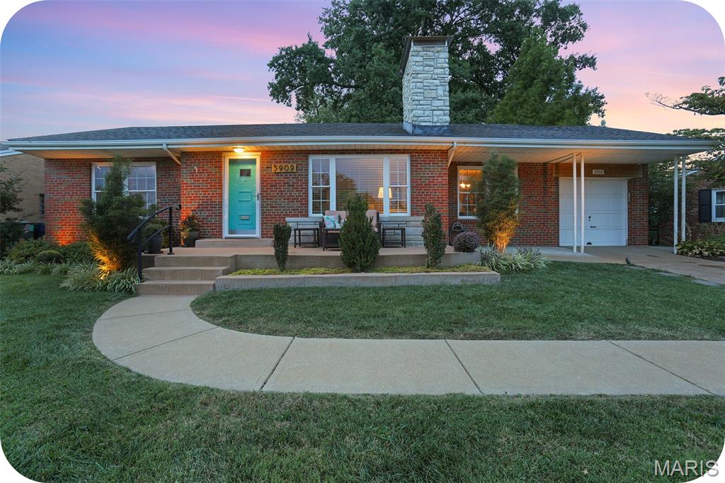 Open house THURSDAY 9/24 from 4-6pm. Welcome to the quintessential St. Louis Hills ranch—where you get the best of both worlds: the convenience and energy of city living, paired with the kind of safe, close-knit neighborhood charm that’s getting harder and harder to find. Enjoy evening walks to Francis Park for a sunset stroll or outdoor yoga, grabbing a happy-hour cocktail with friends at Rockwell Beer Garden & living in a community where neighbors actually know each other—and yes, will absolutely lend a hand when you’re one egg short of finishing a loaf of banana bread. It’s that rare kind of place where you can be part of a true neighborhood while still being minutes from everything you want and need. Lovingly maintained by the current owners, this home feels welcoming from the moment you pull up and start taking in the Southwest flair sprinkled throughout. Inside, the living room is drenched in natural sunlight (your houseplants are going to be very happy here), with a cozy fireplace that will quickly become your favorite wintertime spot. The formal dining room opens directly to the kitchen, making entertaining easy and everyday living feel effortless. Three bedrooms and a full bathroom are conveniently located on the main level. Head downstairs for even more living space, including a huge rec room, laundry, tons of storage, and a large second full bathroom—perfect for movie nights, hobbies, guests, or simply spreading out.
And then there’s the screened-in porch. Prepare to spend approximately 90% of your time here. Peaceful, shady, and surrounded by the large fenced backyard, it feels a little like having your very own private park. Add a 5:00 happy-hour cocktail and a few new neighbor friends gathered on the patio, and honestly… what more could you want? Welcome home to Shangri-la; a place where people still wave from the front porch, friends are just a few houses away, and you can have that cozy neighborhood feeling without giving up the convenience of city life. Want more info? Skip the Zillow rabbit hole and reach out to me, the listing agent, directly. I’d love to tell you more or schedule a private tour!