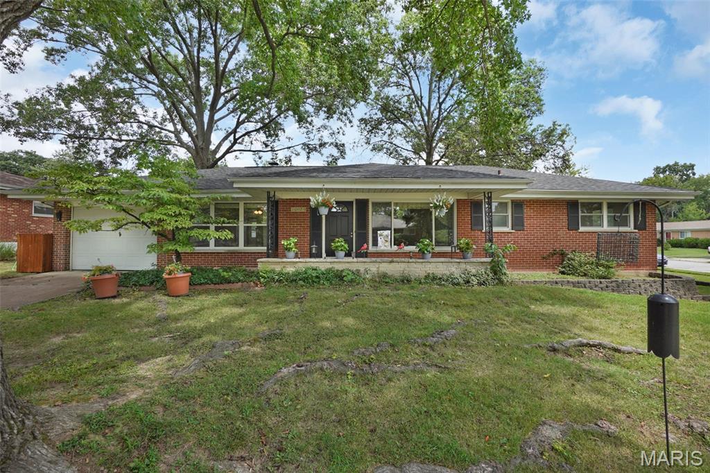 Welcome to 10029 Barberton Drive, a Crestwood home in a quiet, family-friendly neighborhood in the award-winning Lindbergh School District. This ranch style home offers a large Family Room a Living Room and kitchen with LVP Waterproof floors, and three sunlit bedrooms with solid wood floors, also two full bathrooms are on the main floor. The living room offers a panoramic view of the corner lot and remodeled (2022) kitchen provide plenty of space, custom cabinets, Bosch induction cooktop, GE appliances, custom backsplash, and maintenance-free quartz countertops enhancing your cooking experience.  And take note of the great fireplace in that Living Room! With recent updates including a new roof (2025), newer HVAC, Anderson Picture windows, and remodeled bathrooms, this home is move in ready. Located on a generous and perfectly level lot with a one-car garage and ample basement storage, the home gives you space for hobbies, seasonal gear, and play. Parks like Whitecliff and Crestwood are nearby, offering green space and recreation just minutes from your door. You'll also appreciate how convenient the location is - close to shopping, dining, and highways, with easy access to I-44 and I-270. Downtown St. Louis and other areas of the metro are just about 20 minutes away, making commutes and errands simple. If you're looking for a home in a welcoming community, with the right mix of comfort, convenience, and potential, Barberton is the perfect choice.