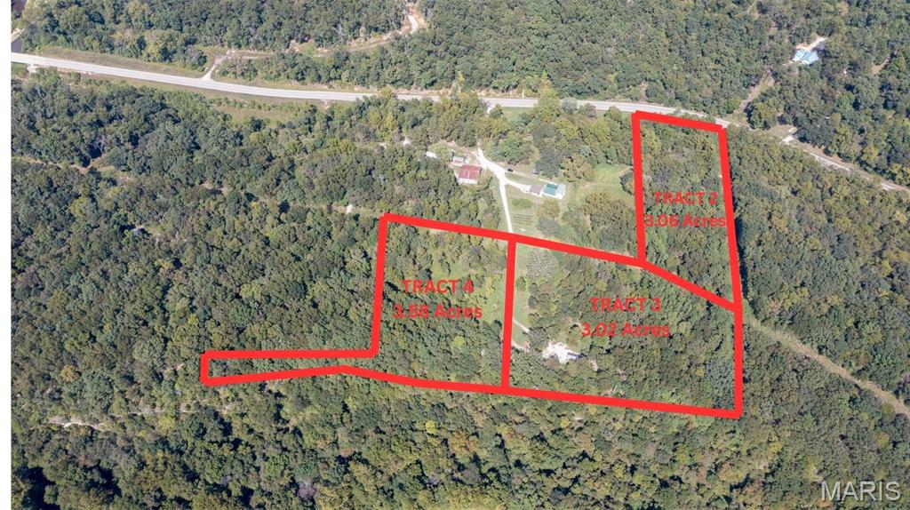 9.66 ACRES + INCOME-PRODUCING AIRBNB CABIN + OZARK VIEWS! This is the kind of property that doesn’t come along often! Three tracts have been combined to offer approximately 9.66 acres of beautiful Ozark countryside, complete with a functioning Airbnb cabin already in place. The 14' x 32' cabin is connected to well, septic, and electric and will be sold fully furnished, making it an incredible opportunity for someone looking for a ready-to-go short-term rental, weekend getaway, hunting cabin, or private retreat. Located approximately 3 miles south of St. James on Highway 8 and just 3 miles north of Maramec Springs Park, the property offers a peaceful setting with convenient access to town and some of the area's best outdoor recreation. Enjoy beautiful bluff ridge views overlooking the Dry Fork and valley, while being close to Woodson K. Woods Conservation Area and Mark Twain National Forest. With nearly 10 acres to explore and a furnished cabin already established, the possibilities are endless. Continue using the property as a successful Airbnb, create your own private Ozark getaway, build additional improvements, or simply enjoy the space, scenery, and privacy.
This property truly needs to be seen to appreciate everything it has to offer! Fiber internet available.
These tracts are surveyed and can be purchased separately. Refer to the following MLS numbers: 26055719, 26056686, 26055722