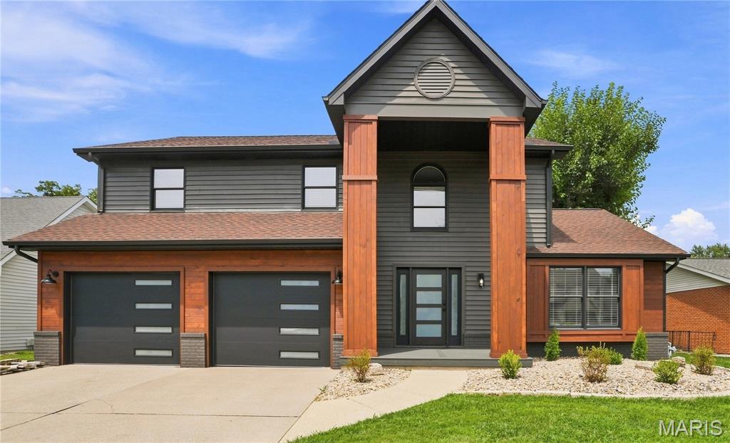 Welcome to this fully renovated Edwardsville home, tucked away on a peaceful cul-de-sac in the desirable Esic neighborhood! The entire interior has been fully renovated, offering the feel of a brand-new home from the moment you step inside. From the flooring and fixtures to the appliances and finishes, everything is brand new and has never been used—giving the next owner a truly fresh, move-in-ready space. Thoughtful modern touches include programmable Bluetooth lighting with adjustable Kelvin color settings, allowing you to create everything from warm, cozy evening light to bright, crisp daylight, along with programmable thermostats for added comfort and convenience.The oversized 2-car garage has also been upgraded with brand-new garage doors and smart openers, providing plenty of space along with added convenience and peace of mind. Step outside and you'll find your own private slice of nature, surrounded by mature greenery and a peaceful, forest-like setting where families of deer are regularly spotted resting in the brush. Despite the tucked-away feel, you're just minutes from everything Glen Carbon and Edwardsville have to offer—including restaurants, shopping, parks, the Madison County Bike Trail, and the Edwardsville YMCA. With a completely renovated interior, modern upgrades, a private natural setting, and an incredibly convenient location, this home offers the perfect combination of fresh finishes, privacy, and everyday convenience. Don't miss your chance to see it in person! Agent Owned.