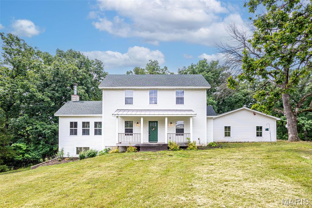 Pack your bags! This is one you don't want to miss! This 4-bedroom home is move-in ready.  Plenty of space inside and out. 23+ acres with a stocked pond, a partially finished walk-out basement and room to store your recreational vehicles in the detached 32'x24' garage/shed. Enjoy family time with the open concept living room, dining room and kitchen. Kitchen, dining room, and living room have new flooring for you to enjoy!  Several recent updates to the interior and exterior.  Enjoy the morning sun on the front porch.  Light the grill and BBQ away on the rear deck! Just inside from the oversized 3 car garage is storage and main floor laundry.  Enjoy the outdoors in the front with parklike settings.  Rear of the property is wooded for any hunting, hiking, or explore. Additional Rooms: Mud Room