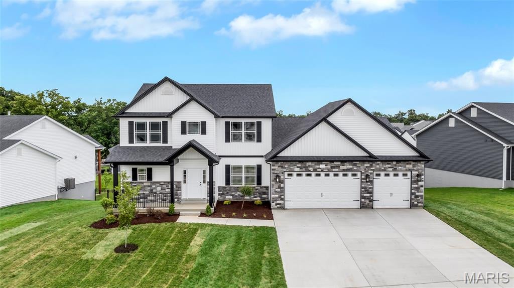 Another absolutely stunning new build from Jeff Kelly Homes! Move In Ready! Will not last long! Completely loaded with features including but not limited to fully finished basement,  3 car garage, 8 ft garage doors, large deck, large patio, 1 garage door opener, iron mailbox, sodded front and rear yard, landscaping, front and rear inground sprinkler, partial stick on stone front elevation, upgraded siding, upgraded exterior lighting package, architectural shingles, prairie style low e windows, LVP though out, upgraded carpet, 9 ft ceilings, upgraded interior light package, upgraded plumbing fixture package, upgraded cabinets with hardware and soft close,  upgraded paint, 5 1/4 inch baseboards, custom trim package, and so much more! Schedule your showing today to see for yourself!