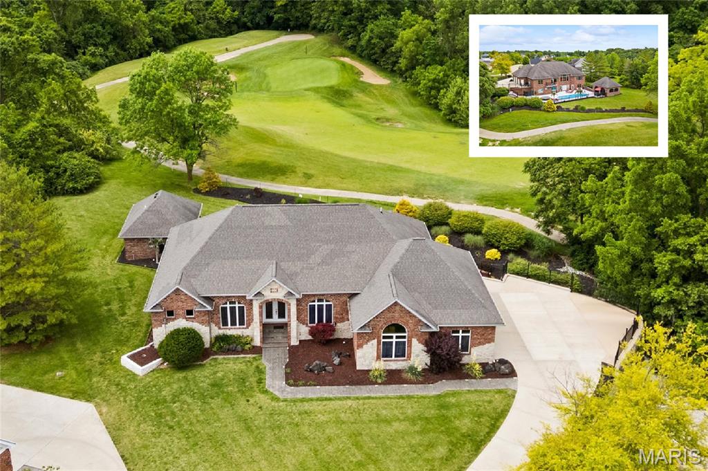 Experience luxury living at its finest in this architectural masterpiece, showcasing exceptional custom craftsmanship and meticulous attention to detail throughout. This stunning residence features 3 spacious bedrooms, soaring vaulted ceilings, and an open, airy design that perfectly blends elegance and comfort. The oversized side-entry 3+ car garage offers abundant space for vehicles, hobbies, and storage, while a secure bunker-style storage area beneath the garage provides added peace of mind.

The expansive walkout lower level is designed for entertaining, complete with a beautiful bar, second kitchen area, and ample space for gatherings, recreation, or relaxation. Enjoy breathtaking golf course views from multiple vantage points throughout the home, creating a picturesque backdrop year-round.

Step outside to your private resort-style backyard retreat featuring a saltwater pool with elegant arch entry, poolside kitchenette, inviting fireplace, and dedicated pool storage. Whether hosting guests or enjoying a quiet evening at home, this outdoor oasis delivers the ultimate in luxury living.