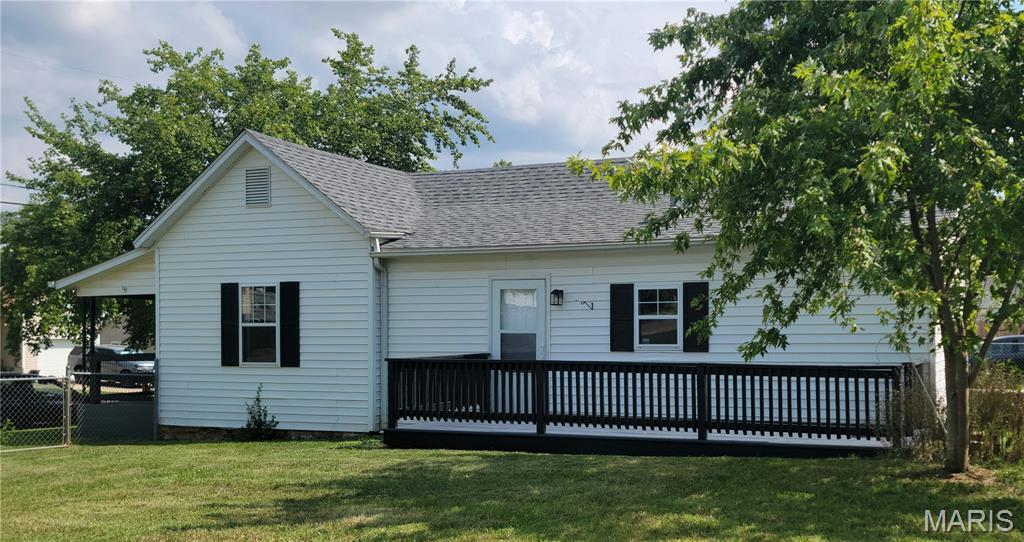 Not every home has to be big and perfect..it just has to be what works for you! This 2 bed, 1 bath home features new flooring, walls and ceilings, lighting, breaker panel and so much more! We did the remodeling for you..we added country charm to a well thought out starter home or a forever home. Come sit on the covered front porch or grill on the deck, both offer a feeling of relaxation. Watch your child or grandchildren play in the large fenced in back yard where pets can roam freely.  A shed offers extra storage along with a 2 car carport. This house is being sold As Is. Seller will only consider repairs for loan purposes only. Seller is a Real Estate Agent. ( Taxes show total living area at 784 Sq ft. Interior living area has been measured by a non-qualified person which shows 922 sq ft. All measurements by non-qualified person may be inaccurate.) Property has passed for city occupancy.