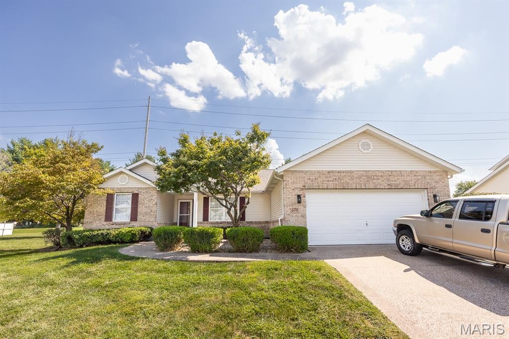 YOU WILL LOVE THIS TURN-KEY, BEAUTIFULLY MAINTAINED AND UPDATED RANCH HOME! Offering an open floor plan and a full basement, the spacious layout allows space for all your needs. The main level features fresh paint throughout, updated light fixtures, NEW carpet and NEW LVP flooring. The vaulted living room features a cozy fireplace, while the kitchen offers NEW countertops, stainless appliances, generous cabinets and a breakfast nook that opens to the backyard. The main level also offers a flex space that can be used for a home office, playroom, dining room or whatever you need the space for. The finished lower level provides even more flexible living space with a large recreation/family room, another full bathroom and plenty of space for storage. Outside, enjoy the covered patio and private backyard with plenty of room to relax, entertain or play. Additional features include spacious bedrooms, main-level laundry, a NEW roof and NEW A/C unit. Don't miss out on this updated home that's ready for a new owner! Conveniently located close to restaurants, shopping and interstate access.