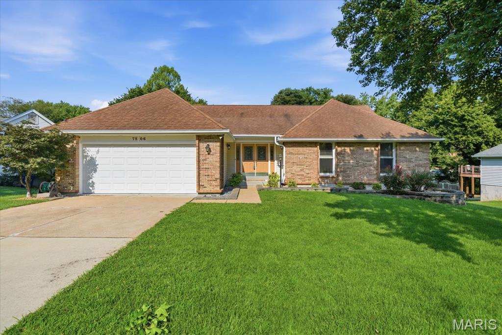 Est 1991. Set on a quiet cul-de-sac in the Lindbergh district, this 3-bedroom, 2-bath single-story ranch gives you main-floor living with plenty of room to expand. The living room features high vaulted ceilings, hardwood floors, and a gas fireplace just off the dining room. The large kitchen has granite countertops, loads of cabinet space, stainless steel appliances, and a bright, cheery eat-in area with a built-in desk that leads right to the back deck. You’ll also find main-floor laundry, a mudroom, and direct access to the two-car garage right off the kitchen. The primary suite includes vaulted ceilings, a walk-in closet, and an attached bath with dual sinks, a walk-in shower, and a soaking tub. Downstairs, the walkout basement already has some finished drywall, a rough-in for another bathroom, and nice high ceilings. Plenty of yard space outside with room for gardening, grilling, and relaxing. Minutes from Grant’s Trail, Grant’s Farm, and Whitecliff Park, along with easy access to neighborhood dining, shopping, and highways.