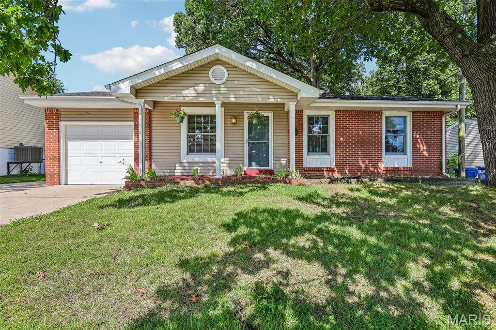 Lots to love about this updated 3-bedroom home in Fenton, MO! This 3-bedroom, 3-bath home features a fresh, bright kitchen with new countertops, stainless steel sink, faucet and disposal, custom solid wood cabinetry, large pantry, and space for a counter-depth refrigerator. The primary suite features custom cherry cabinetry and a recently expanded and updated bath with double sink vanity. New carpet has been added in the main-floor bedroom, lower-level living room, and bonus room. The finished lower level provides plenty of additional living space with a family room, exercise room, office, and bonus room, along with new laminate flooring in the exercise room and office. Outside, enjoy the newly rebuilt deck and stairs overlooking the large, shaded backyard. A gate provides direct access to 3 acres of wooded common ground with a playground. Additional features include Marvin aluminum-clad/wood windows, an 8x12 storage shed with electric and attic storage, lean-to storage area, and 1-car garage. NEW roof on home and shed in March 2026!