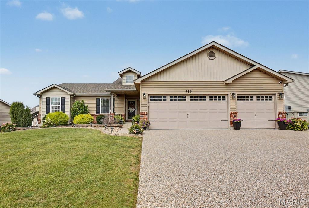 Beautifully maintained, truly move in ready and located in the highly sought-after North Point attendance area of the Wentzville School District, this pristine ranch offers nearly 2,500 sq ft of finished living space with 3 bedrooms, 3 full baths and a 3 car garage.

Designed for comfortable everyday living and easy entertaining, the open floor plan features vaulted ceilings, abundant natural light and fresh, newly installed carpet throughout all previously carpeted areas. The updated kitchen is the heart of the home with quartz countertops, center island, breakfast bar, pantry, stainless appliances and attractive LVP flooring flowing seamlessly into the main living and dining areas.

All 3 bedrooms are conveniently located on the main level along with 2 full baths and main floor laundry, making day-to-day living simple and functional. Downstairs, approximately 1,045 sq ft of additional finished space creates an entirely different lifestyle opportunity with a spacious family and recreation area, full bath and flexible den, office or additional sleeping area, perfect for movie nights, game days, guests or working from home.

Step outside to the stamped concrete patio and enjoy the beautifully landscaped, fenced quarter-acre yard with irrigation system. An attached pergola creates the perfect shaded spot for morning coffee, relaxing at the end of the day or entertaining family and friends. There is plenty of room for pets, play and outdoor enjoyment, while a convenient concrete utility pad beside the garage keeps trash cans, lawn equipment and other outdoor necessities neatly tucked away.

The finished 3 car garage adds even more versatility for vehicles, hobbies and storage. Thoughtfully updated, meticulously cared for and offering exceptional indoor and outdoor living space in one of the area’s most desirable school attendance areas, 319 Vigilant is ready for its next chapter!