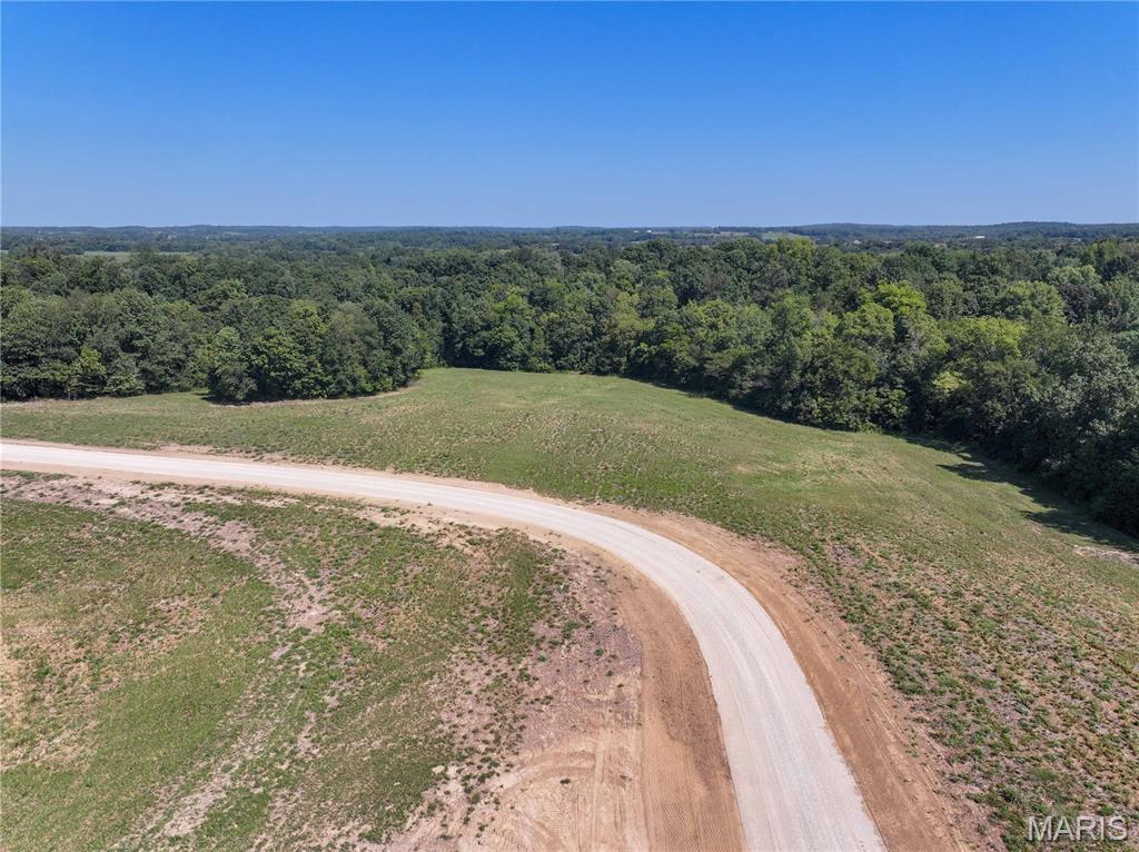 Discover the perfect blend of country living and convenience with this 7.5± acre tract located just outside Jackson, Missouri, off Highway 34. Situated in the desirable Kinder Farms Subdivision, this property offers a beautiful combination of open ground and wooded acreage with plenty of room to create your ideal homesite. Electric and water are available, and livestock, horses, and outbuildings are permitted, making this a great option for a small homestead or mini-farm. Bring your own builder and make your vision a reality! Light restrictions will apply to help protect the area and your investment. Located approximately 3 miles from Jackson Schools, you can enjoy peaceful country living while remaining just minutes from town.

A survey will be completed prior to closing to determine the exact acreage. Final purchase price will be based on the surveyed acreage and the agreed-upon price per acre.